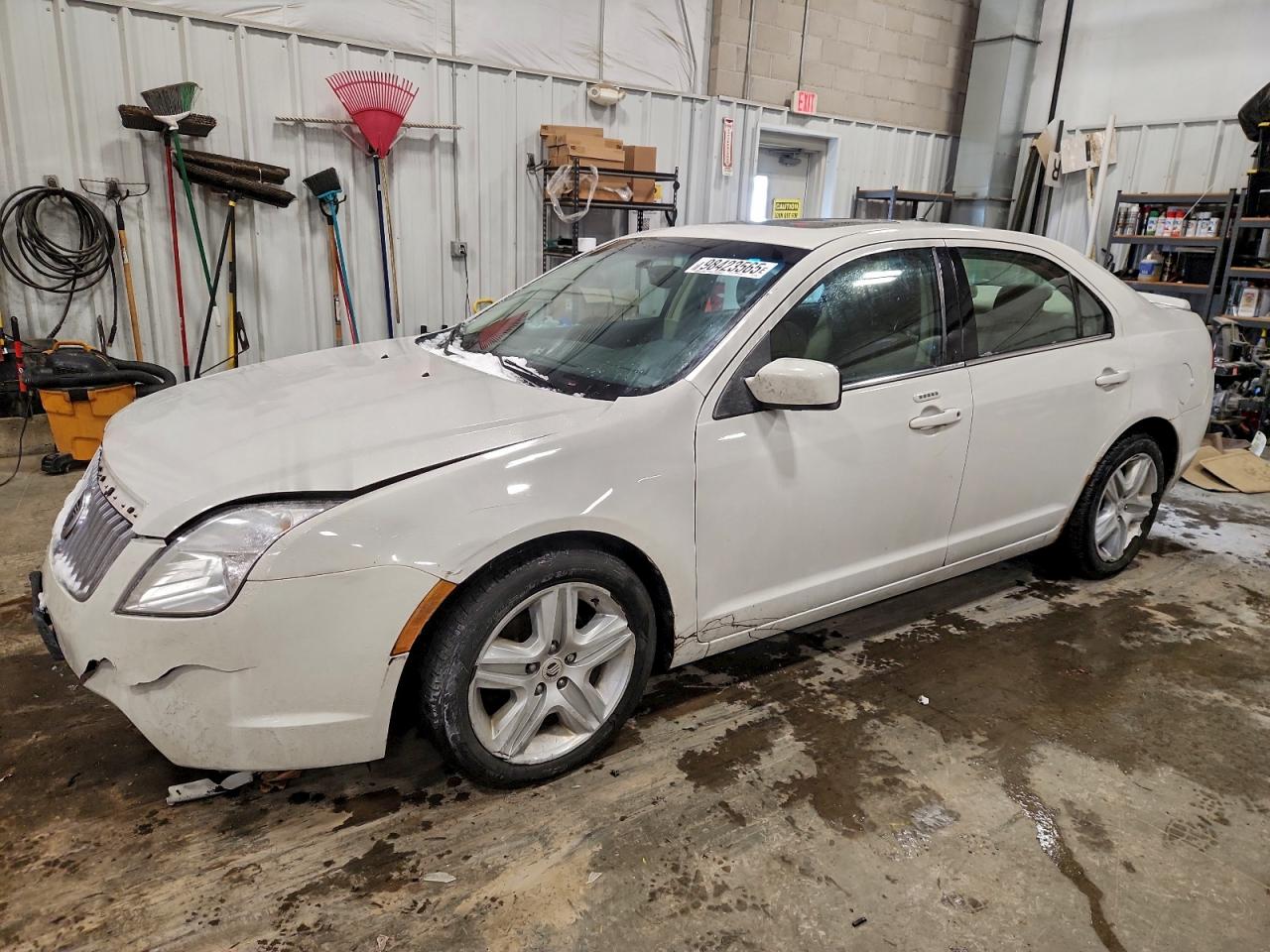 2010 Mercury Milan, VIN 3MEHM0HA5AR665299 — Undercarriage
