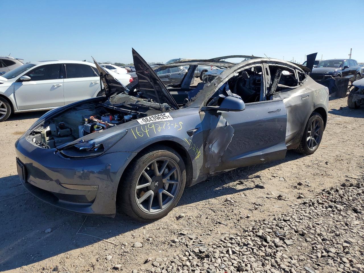 2023 Tesla Model 3, VIN 5YJ3E1EA6PF713244 — Interior fire