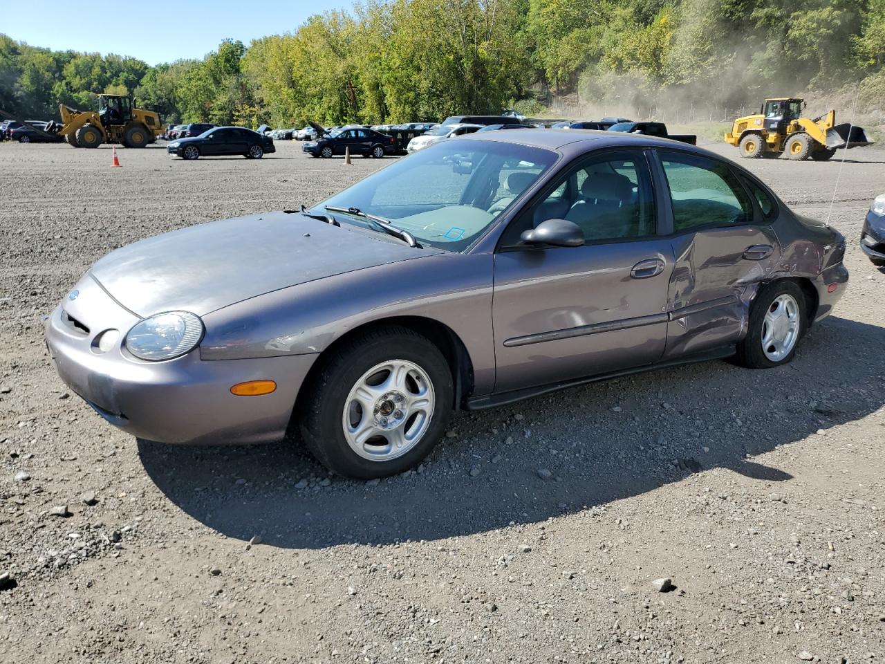 1996 Ford Taurus GL, VIN 1FALP52U9TA247169 — Side