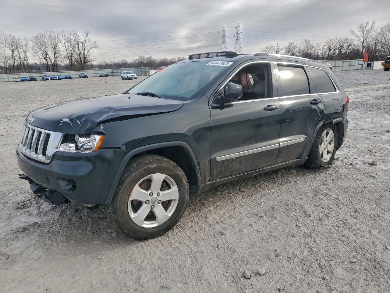 2013 Jeep Grand Cherokee Laredo, VIN 1C4RJFAG0DC649756 — Side