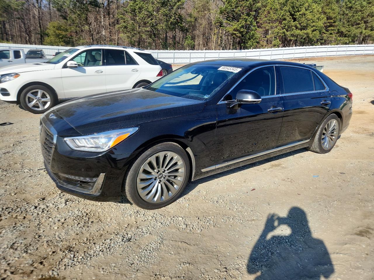 2019 Genesis G90 Premium, VIN KMTF34JA9KU058637 — Side