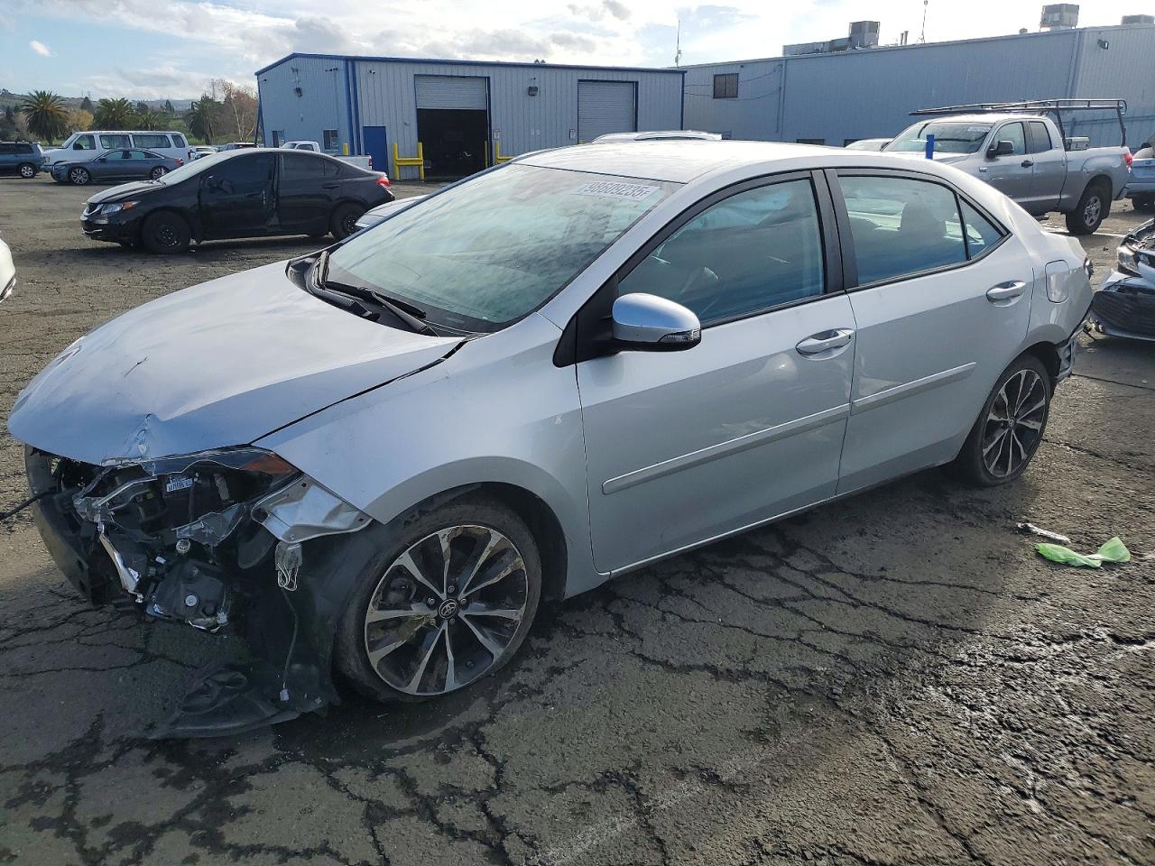 2019 Toyota Corolla LE, VIN 5YFBURHE2KP880421 — Front end