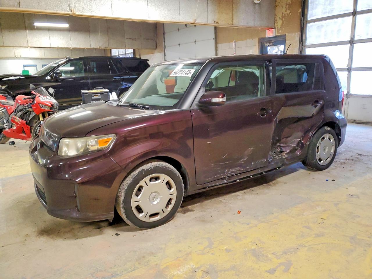2012 Scion xB, VIN JTLZE4FE7CJ029498 — Бок