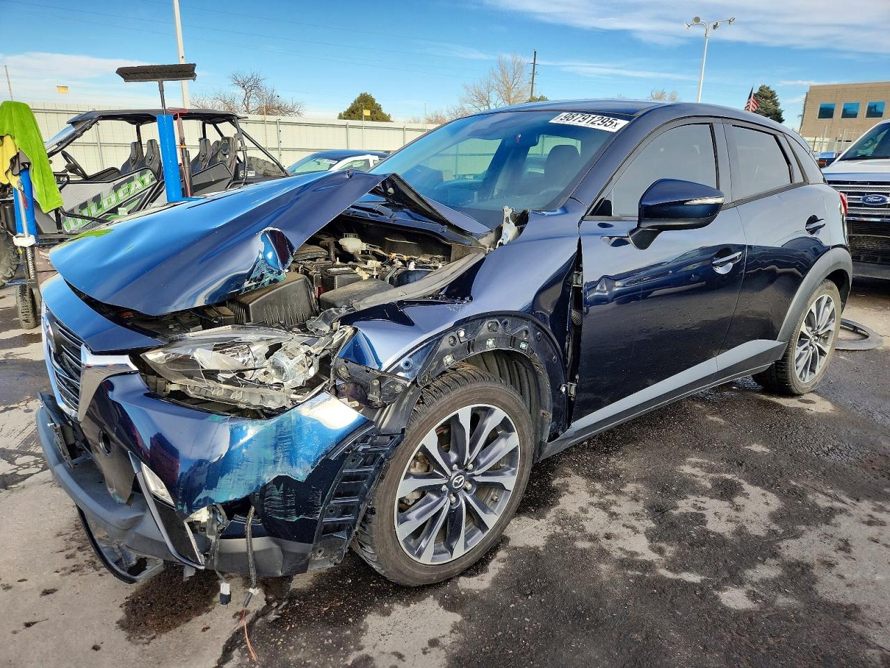 2019 Mazda CX-3 Touring, VIN JM1DKFC70K0430427 — Front end