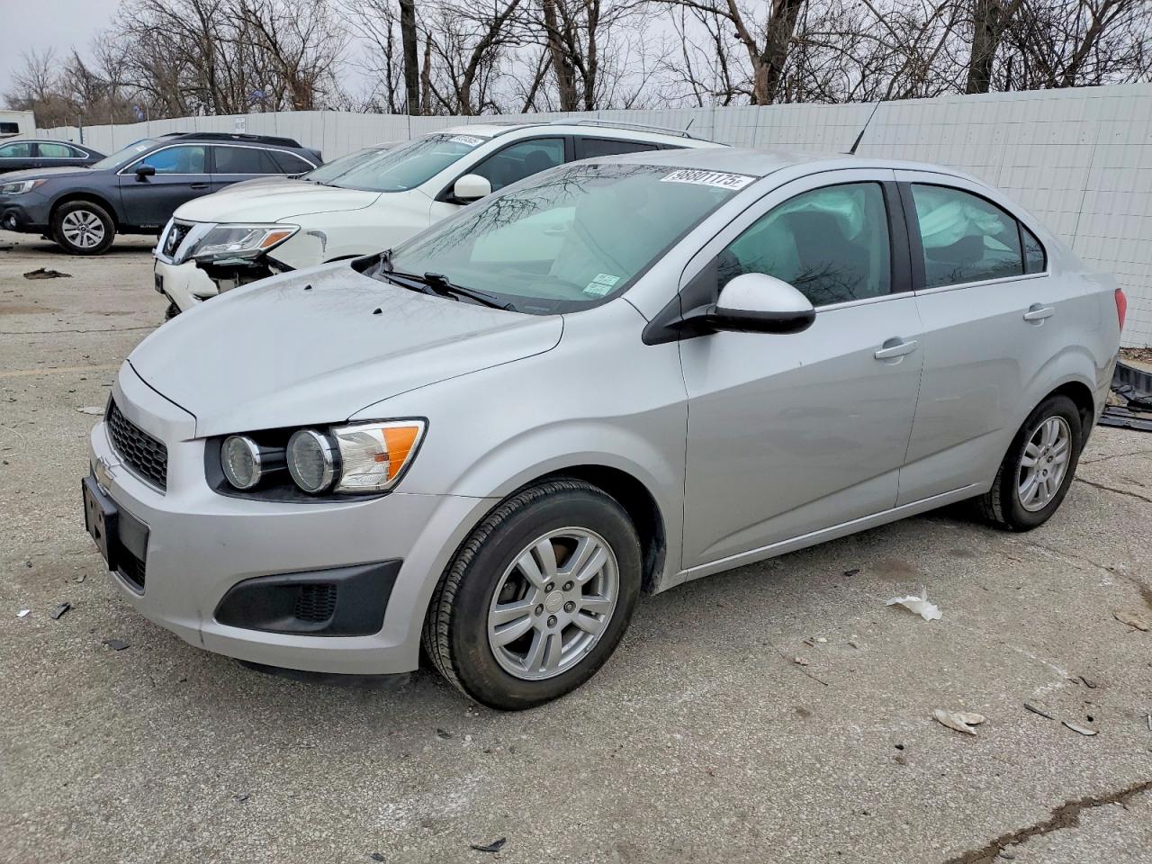 2013 Chevrolet Sonic LT, VIN 1G1JC5SH6D4221363 — Side