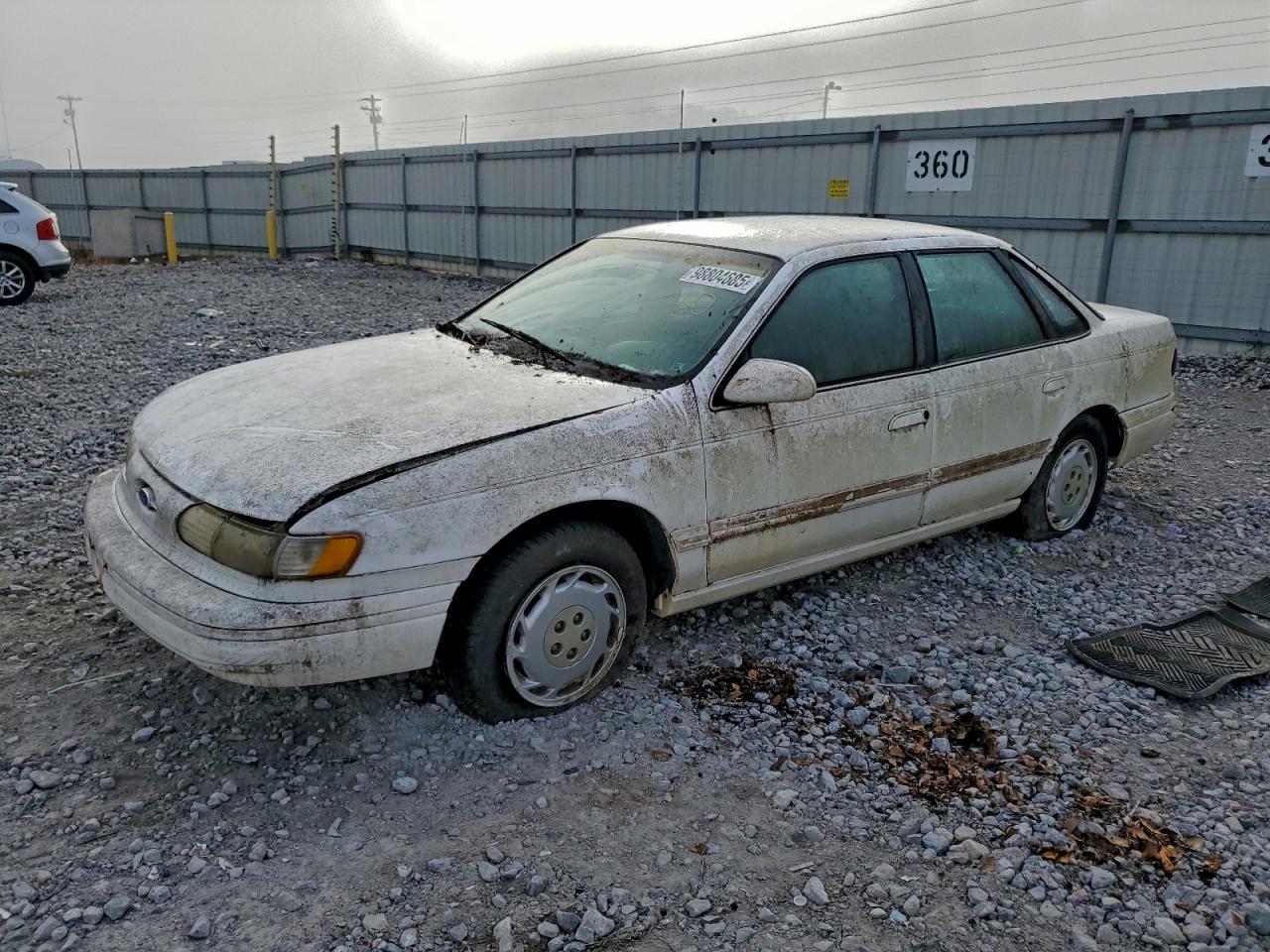 1995 Ford Taurus GL, VIN 1FALP5243SA189896 — Град