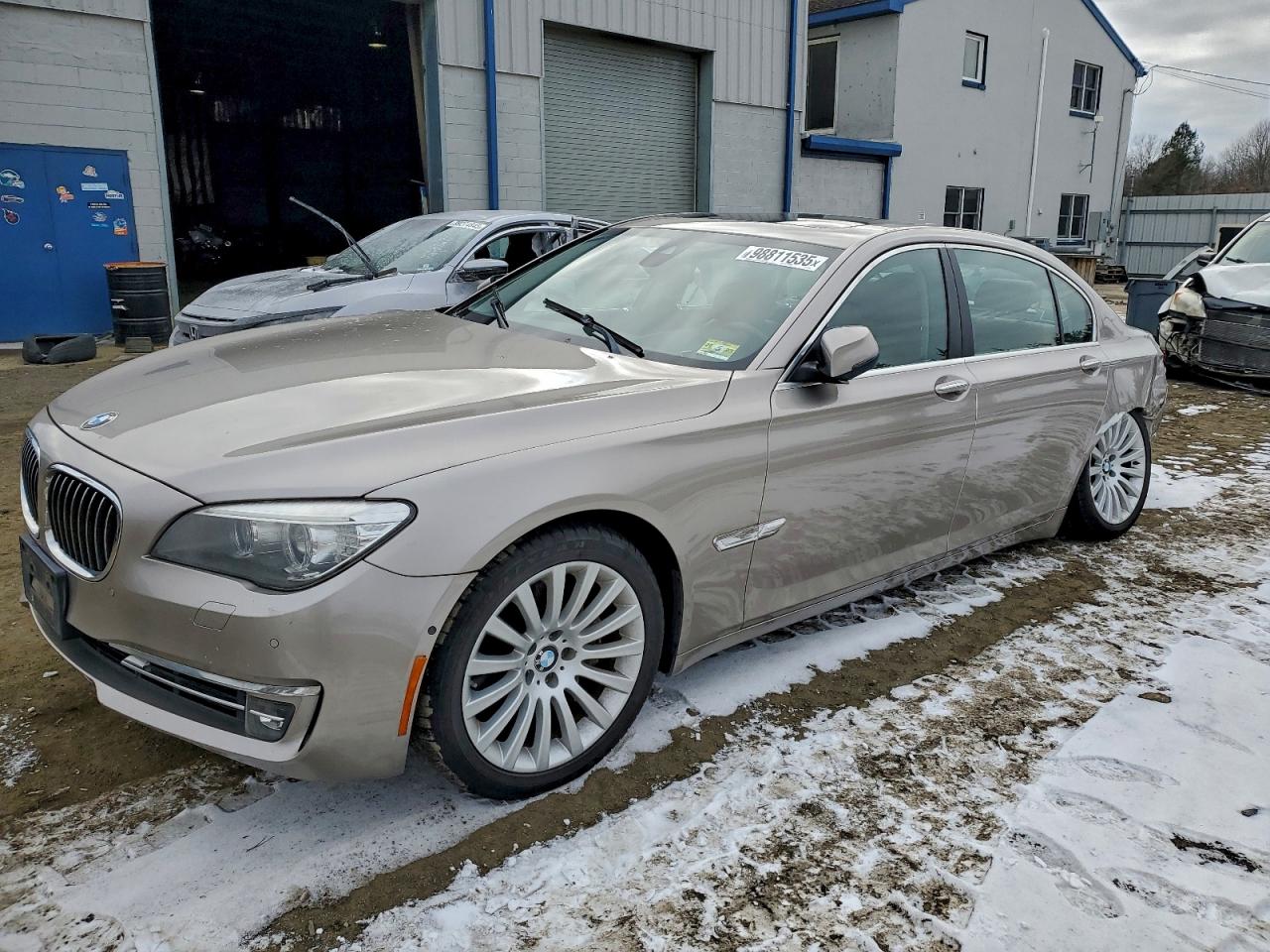 2013 BMW 7 Series 740Li xDrive, VIN WBAYF4C52DDE23726 — Side