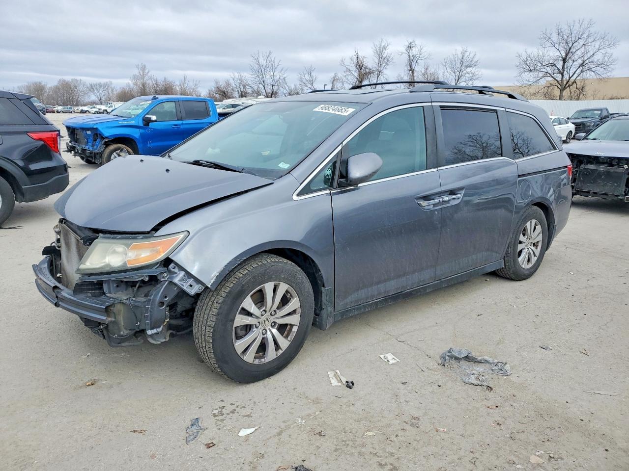 2014 Honda Odyssey EX-L, VIN 5FNRL5H6XEB104590 — Front end