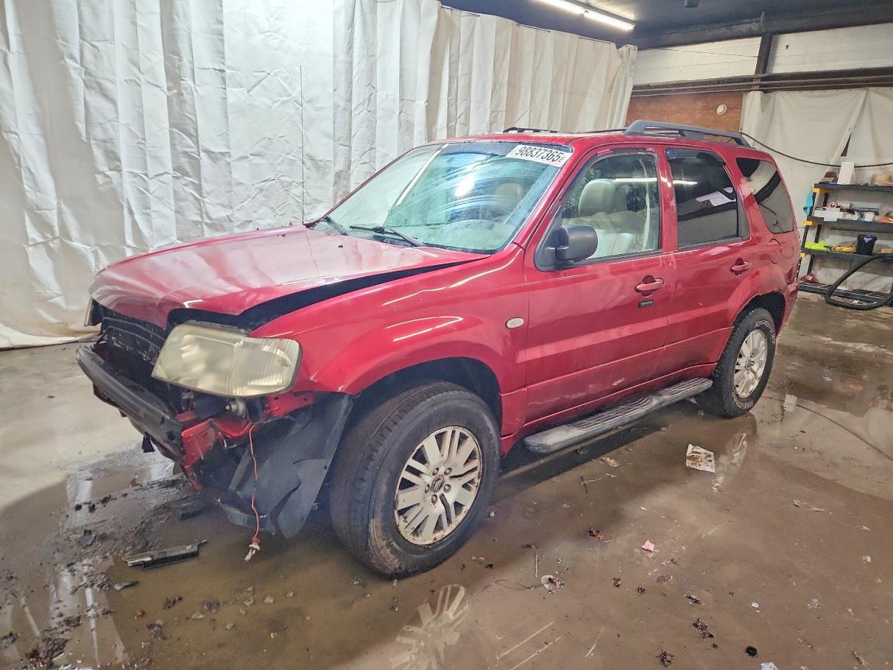 2006 Mercury Mariner Luxury, VIN 4M2CU57116KJ03108 — Rollover