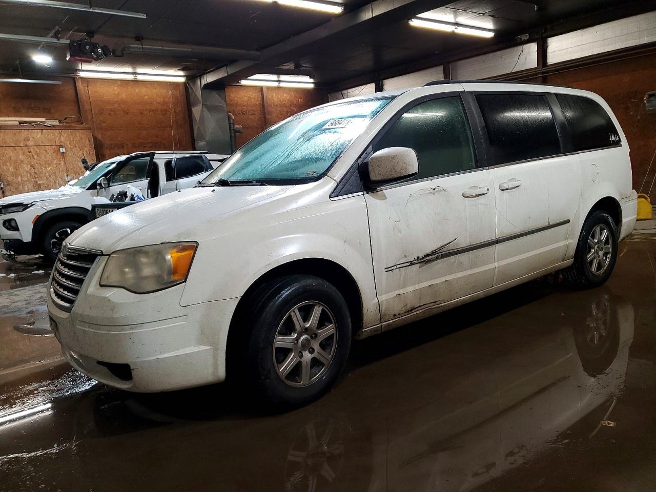 2010 Chrysler Town & Country Touring, VIN 2A4RR5D14AR232275 — Engine fire