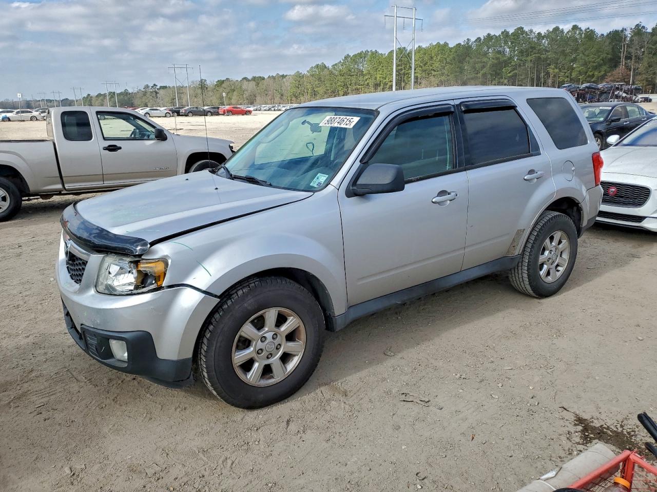 2010 Mazda Tribute Sport, VIN 4F2CY0C72AKM09959 — Front end