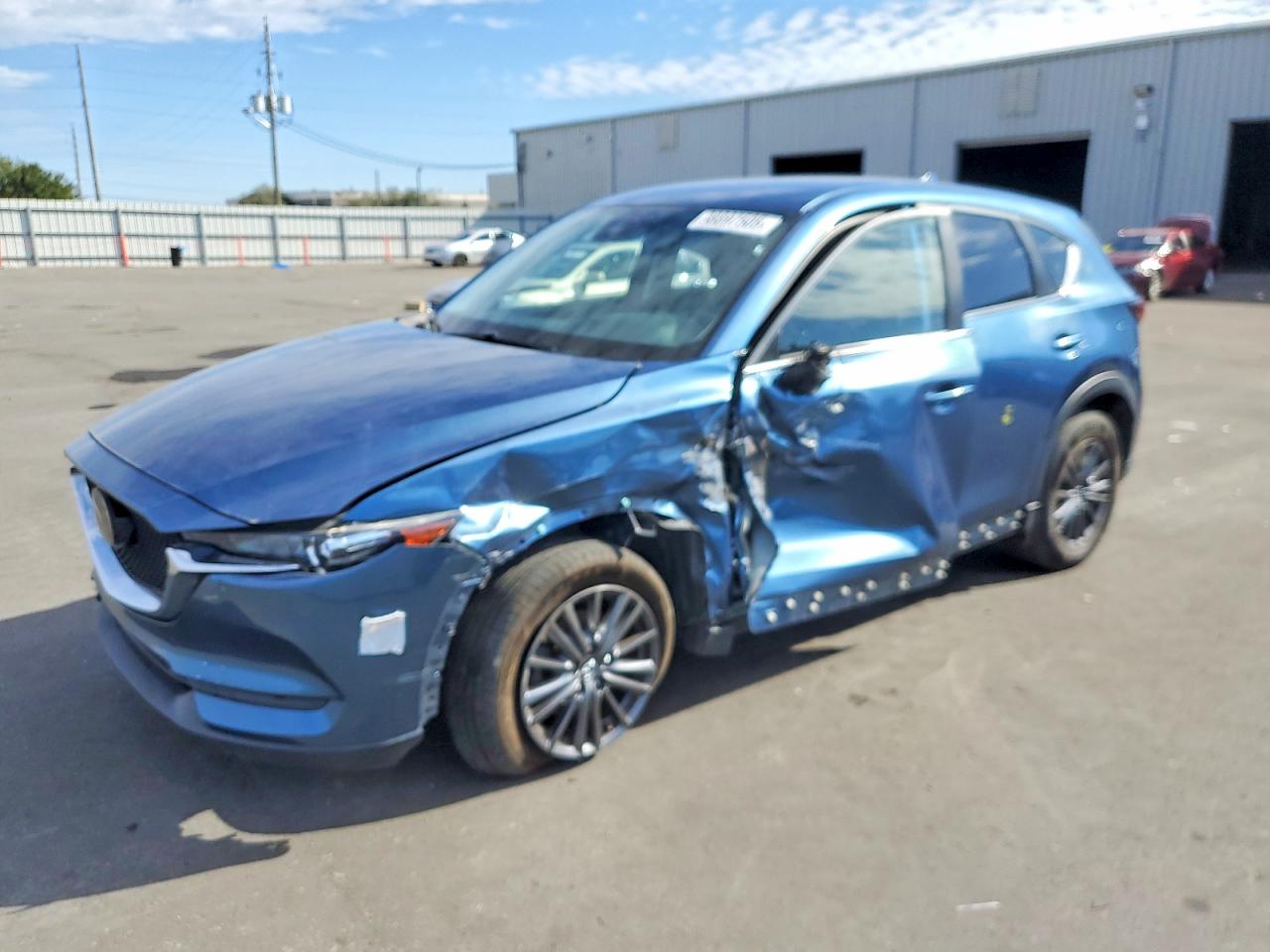 2021 Mazda CX-5 Sport, VIN JM3KFABM4M0389896 — Front end