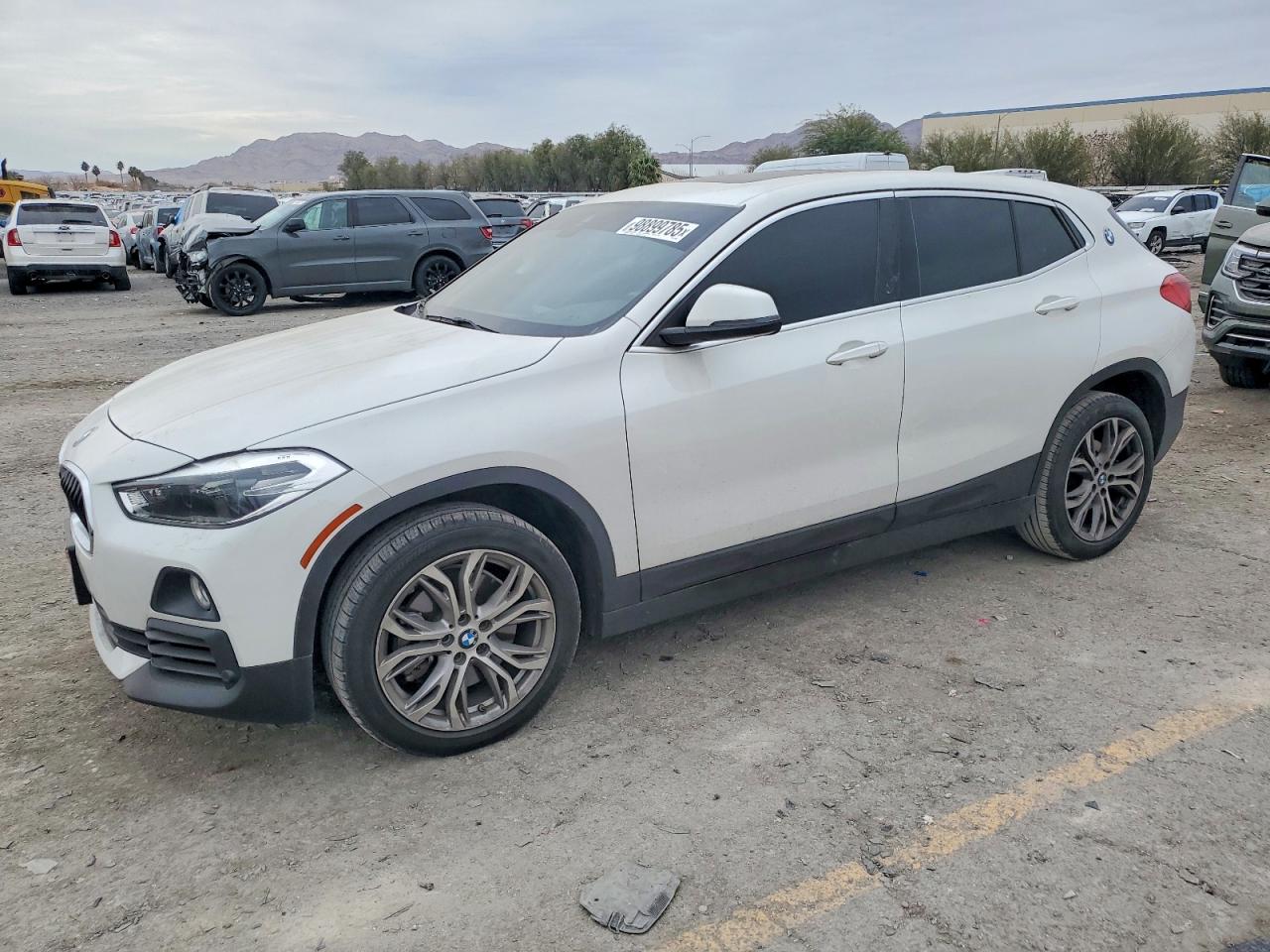 2019 BMW X2 sDrive28i, VIN WBXYJ3C59KEP77150 — Бок