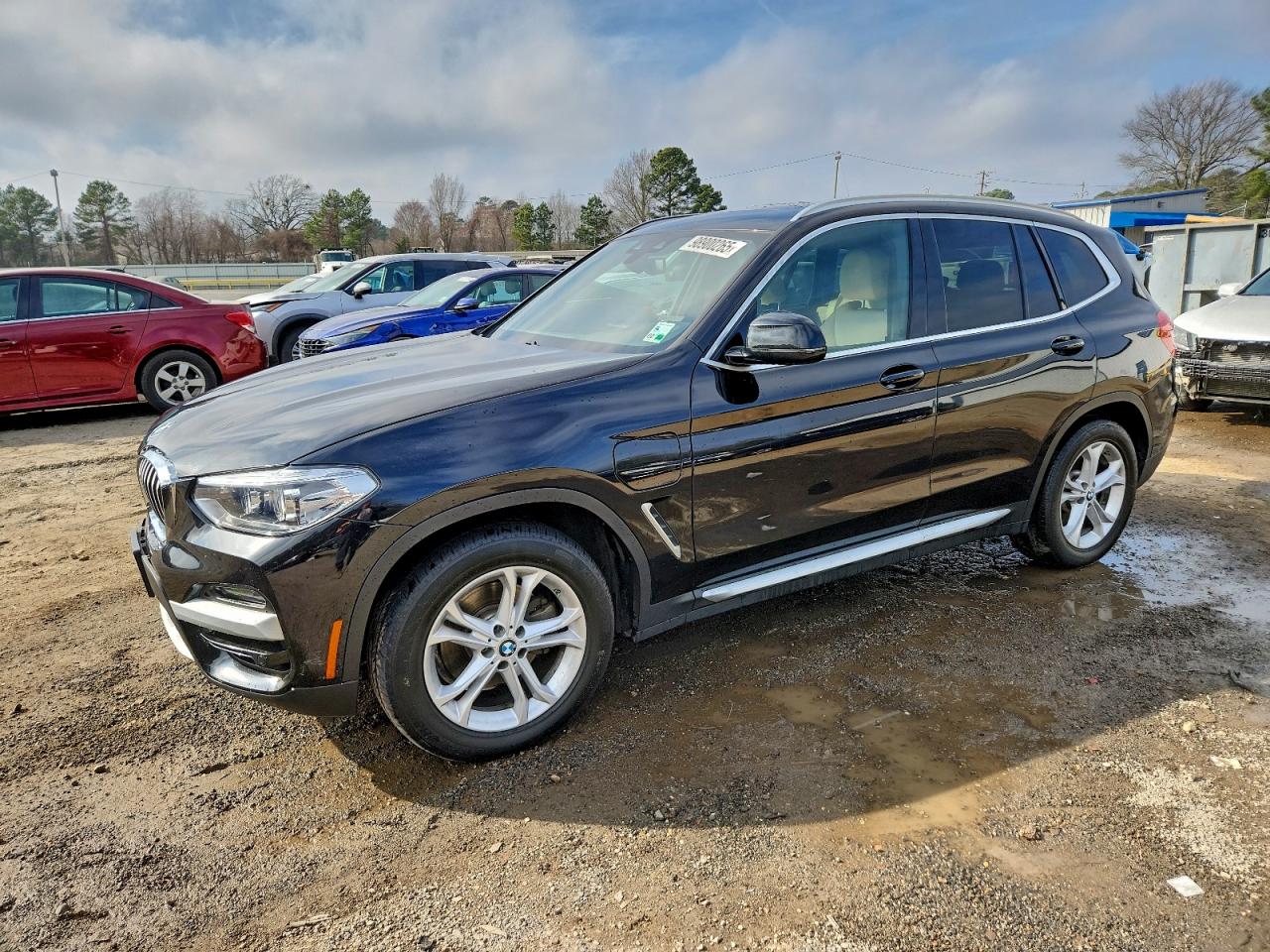 2021 BMW X3 xDrive30e, VIN 5UXTS1C06M9E20048 — Front end