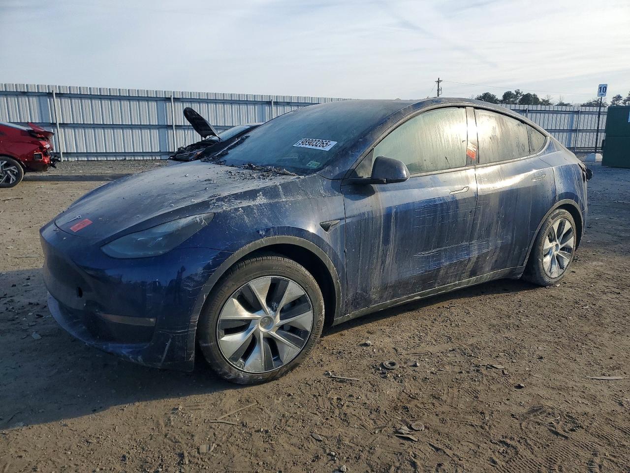 2024 Tesla Model Y Long Range, VIN 7SAYGAEE9RF005272 — Interior fire
