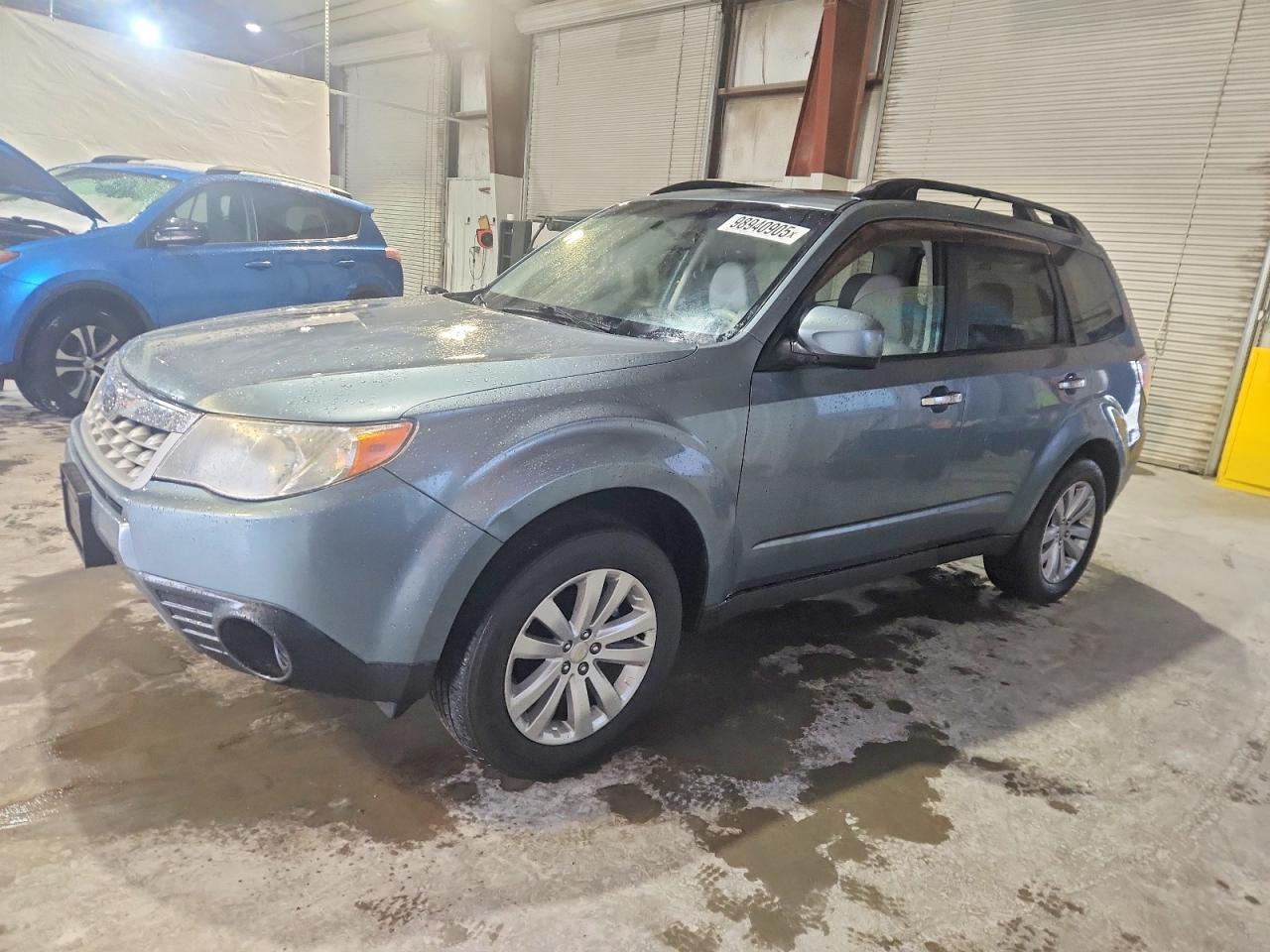 2011 Subaru Forester X Premium, VIN JF2SHADC1BH719324 — Обычный износ