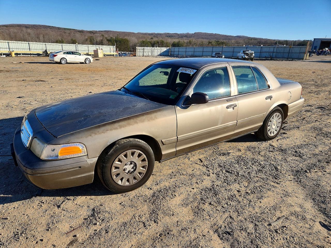 2005 Ford Crown Victoria Standard, VIN 2FAFP73W45X114354 — Side