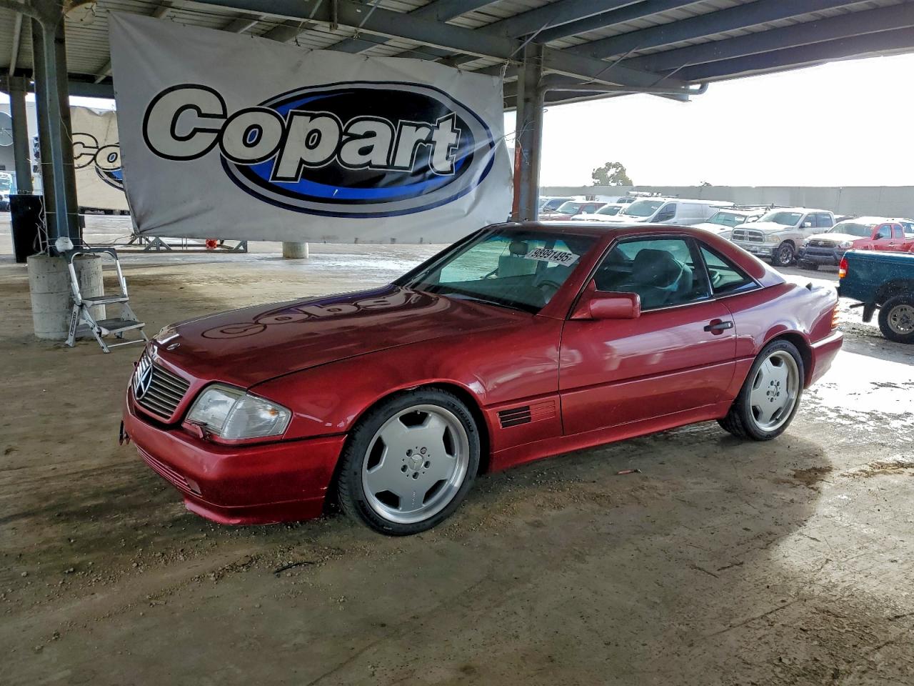 1990 Mercedes-Benz 500, VIN WDBFA66E1LF005799 — Water / flood