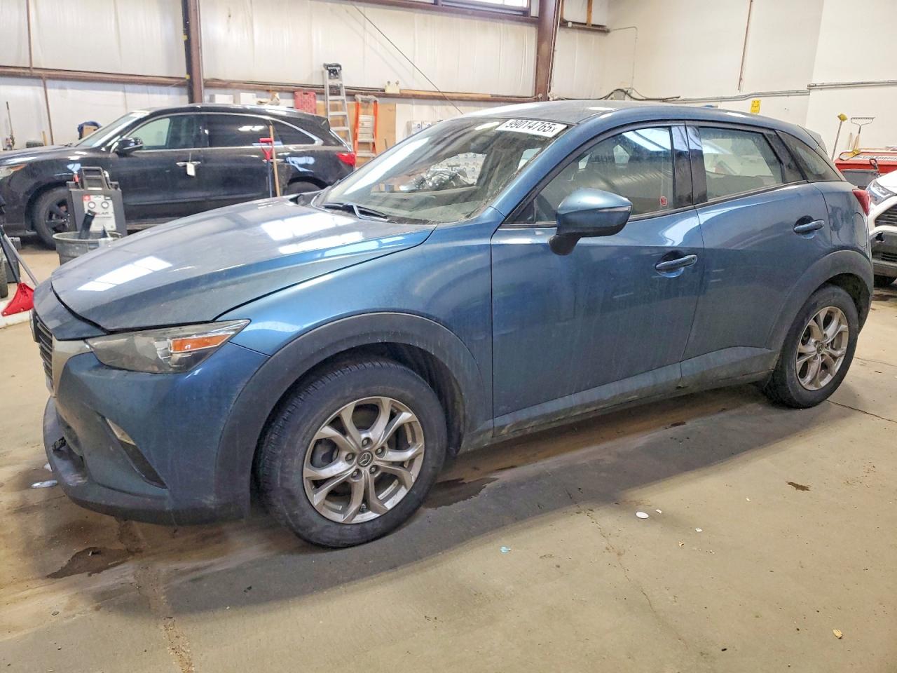 2020 Mazda CX-3 GS, VIN JM1DKFC72L1469838 — Бок