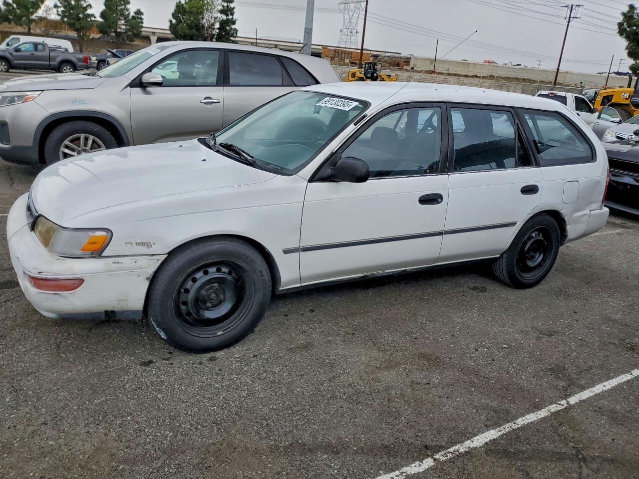 1995 Toyota Corolla DX, VIN JT2AE09V7S0089565 — Side