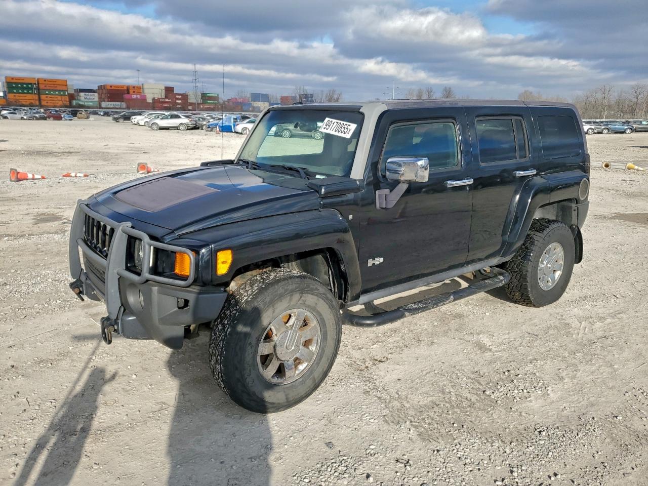 2007 Hummer H3 SUV, VIN 5GTDN13E678252369 — Бок