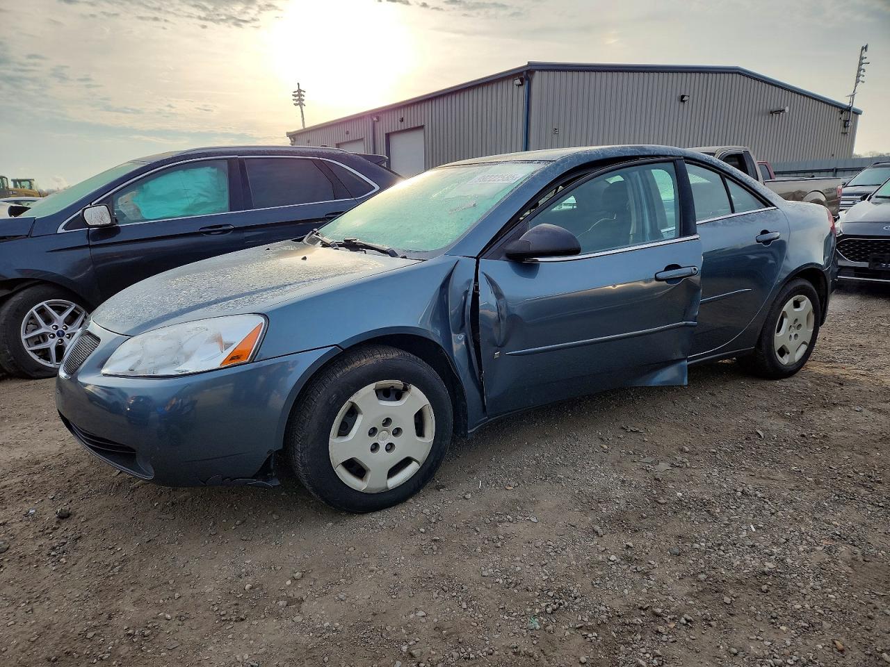 2006 Pontiac G6 1SV Value Leader, VIN 1G2ZF57B064155180 — Side