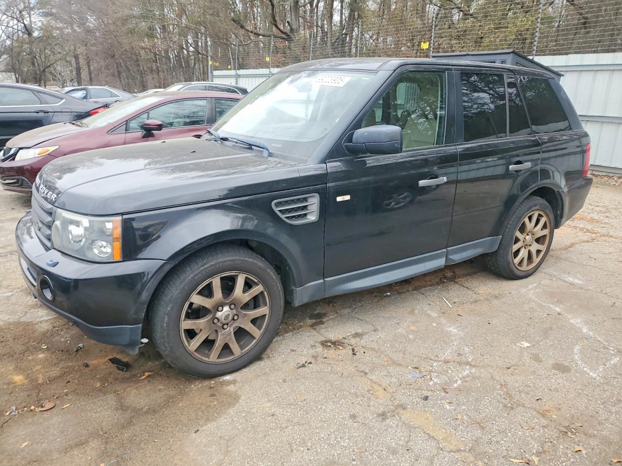 2009 Land Rover Range Rover Sport HSE, VIN SALSF25459A208017 — Minor dents and scratches