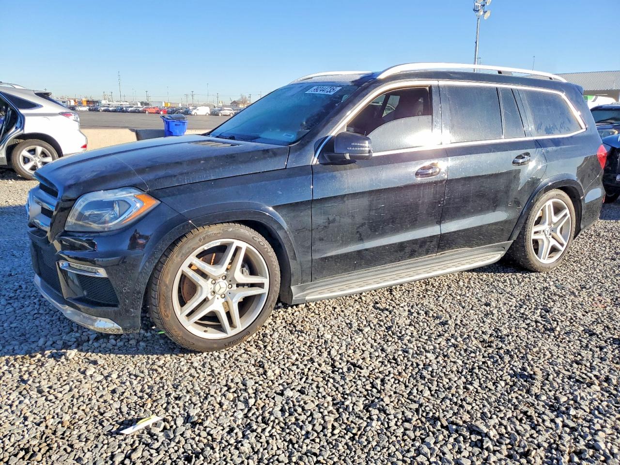 2015 Mercedes-Benz GL 550, VIN 4JGDF7DE7FA476176 — Minor dents and scratches