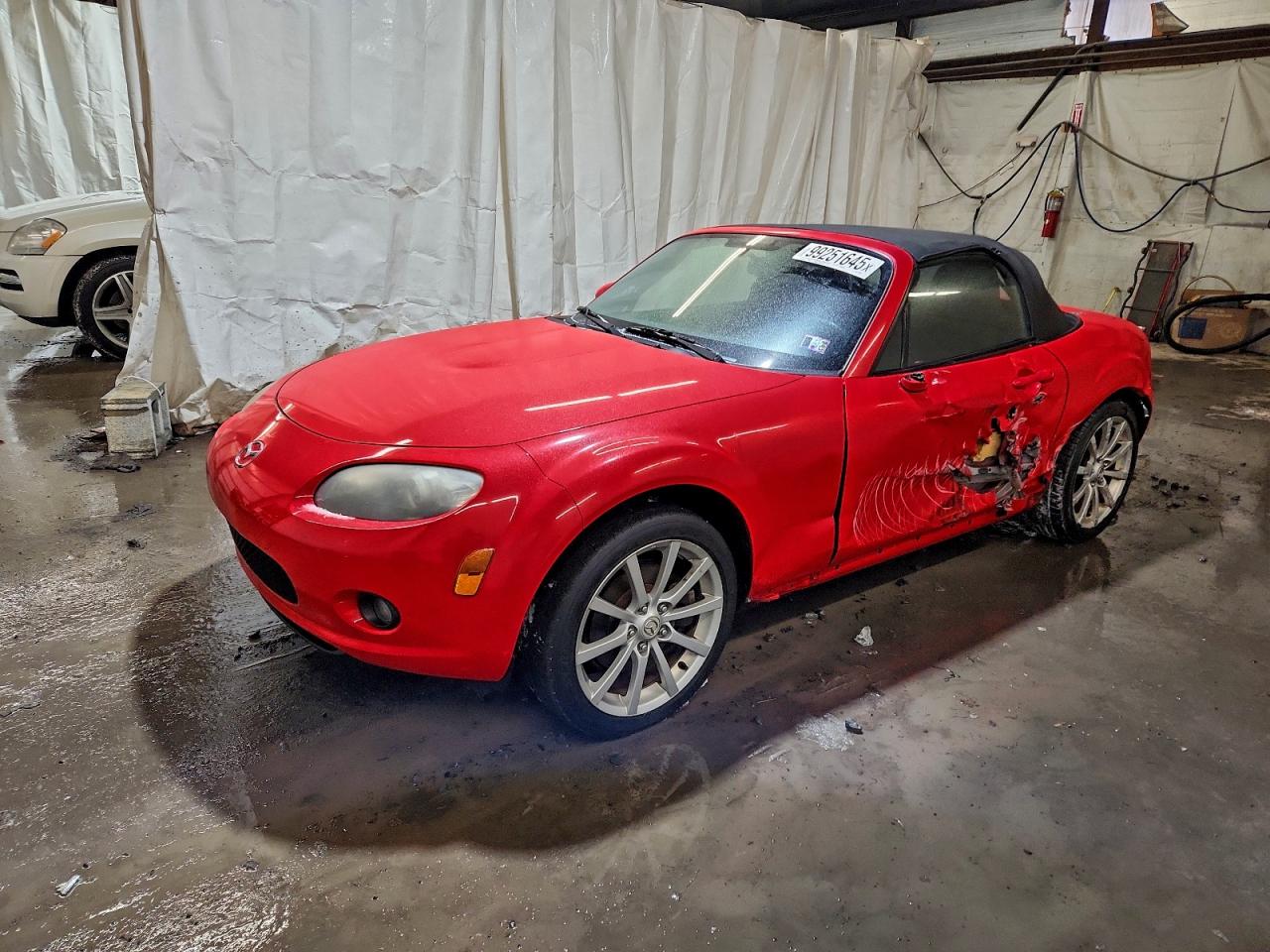 2006 Mazda MX-5 Miata Grand Touring, VIN JM1NC25F160110375 — Side