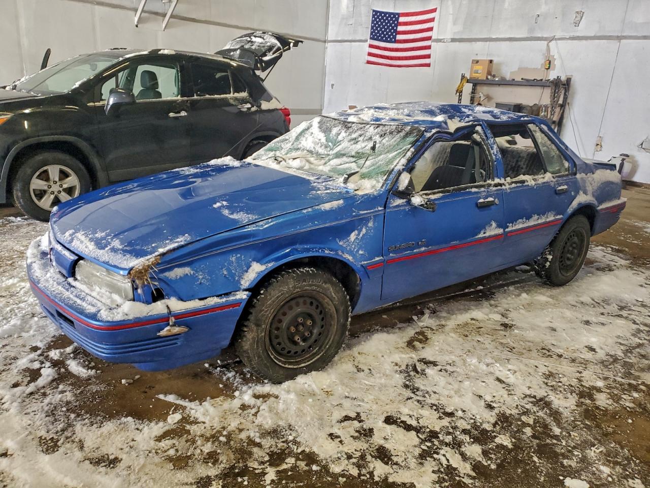 1994 Pontiac Sunbird LE, VIN 1G2JB54H4R7600136 — Rollover