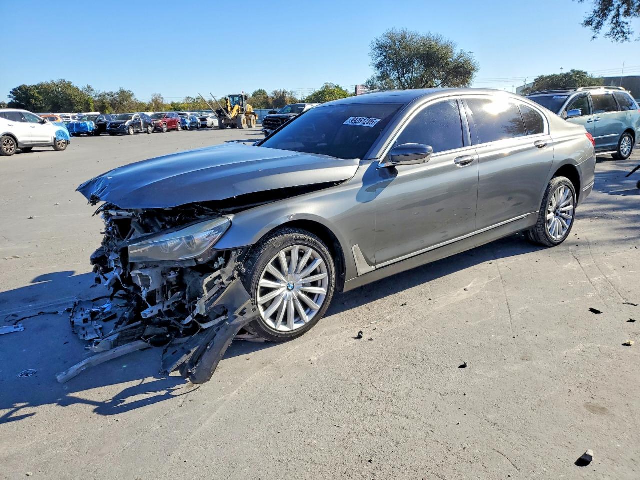 2016 BMW 7 Series 740i, VIN WBA7E2C52GG503904 — Front end