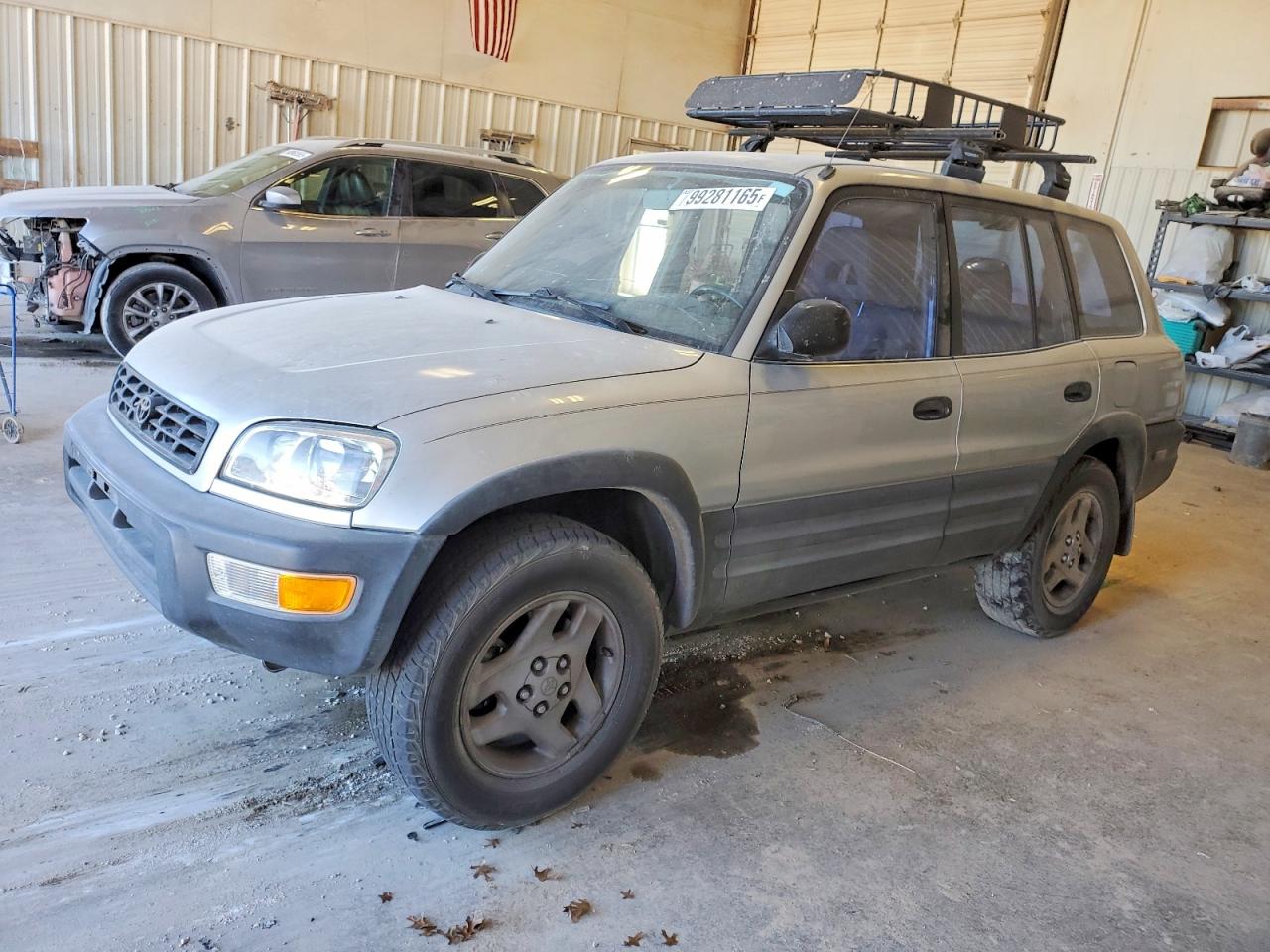 1998 Toyota RAV4, VIN JT3GP10VXW7034544 — Side