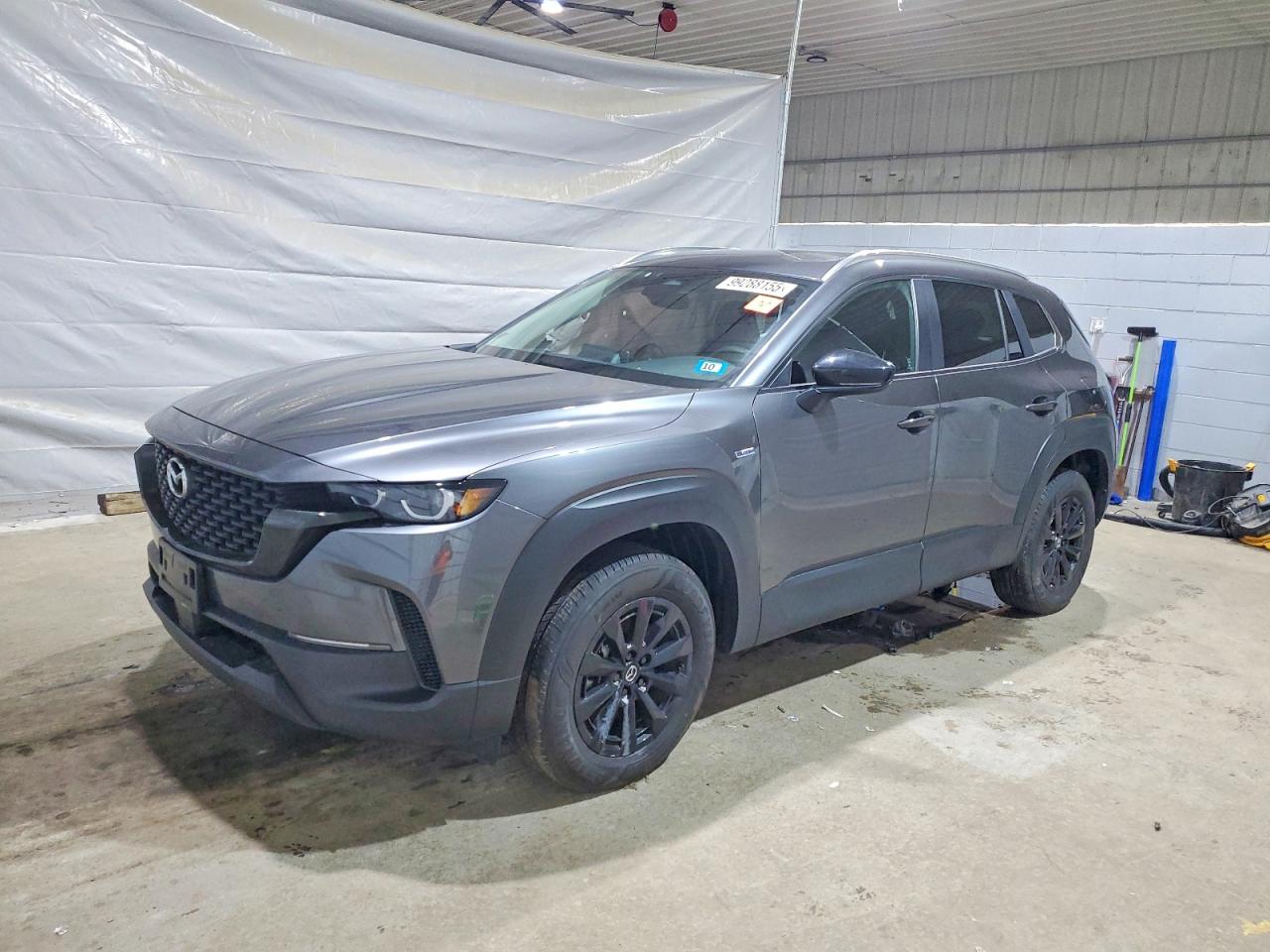 2025 Mazda CX-50 Hybrid Preferred Package, VIN 7MMVAABW0SN124026 — Side