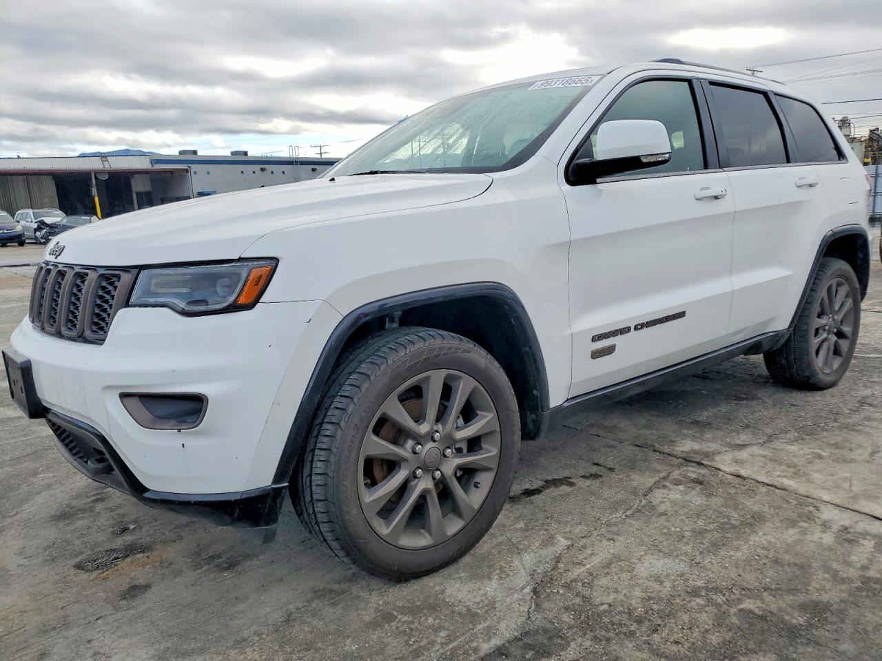 2016 Jeep Grand Cherokee Limited 75th Anniversary, VIN 1C4RJEBM4GC429703 — Side