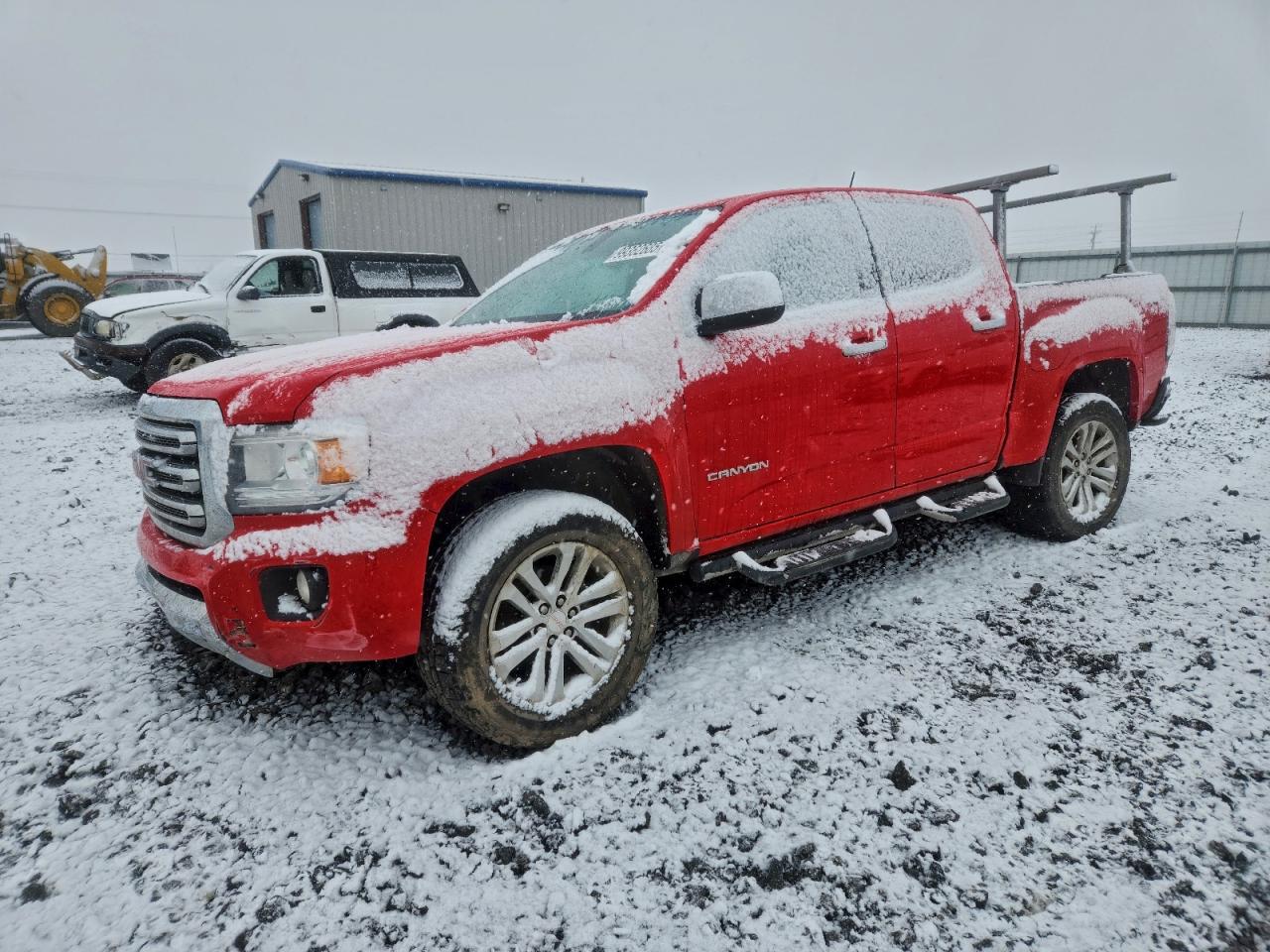 2015 GMC Canyon 4WD SLT, VIN 1GTG6CE38F1178727 — Side