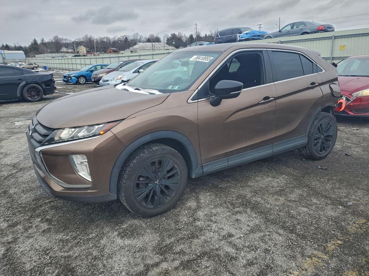 2018 Mitsubishi Eclipse Cross LE, VIN JA4AT4AA7JZ044157 — Rear end