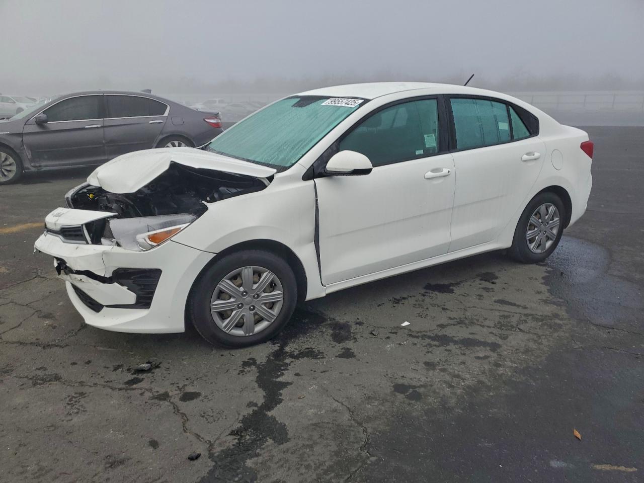 2023 Kia Rio LX, VIN 3KPA24AD0PE590063 — Front end