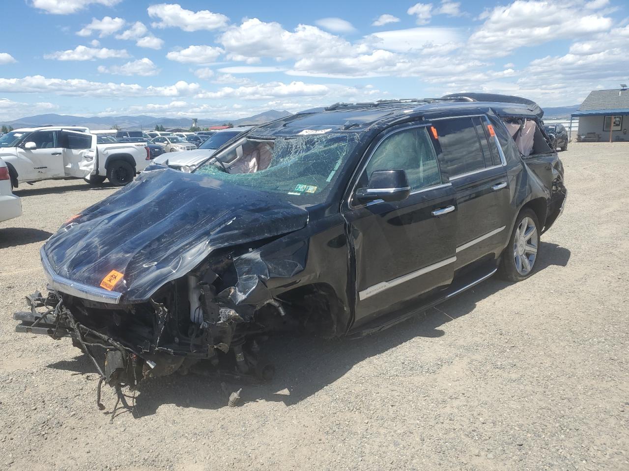 2017 Cadillac Escalade ESV Luxury, VIN 1GYS4HKJ1HR187154 — Rollover