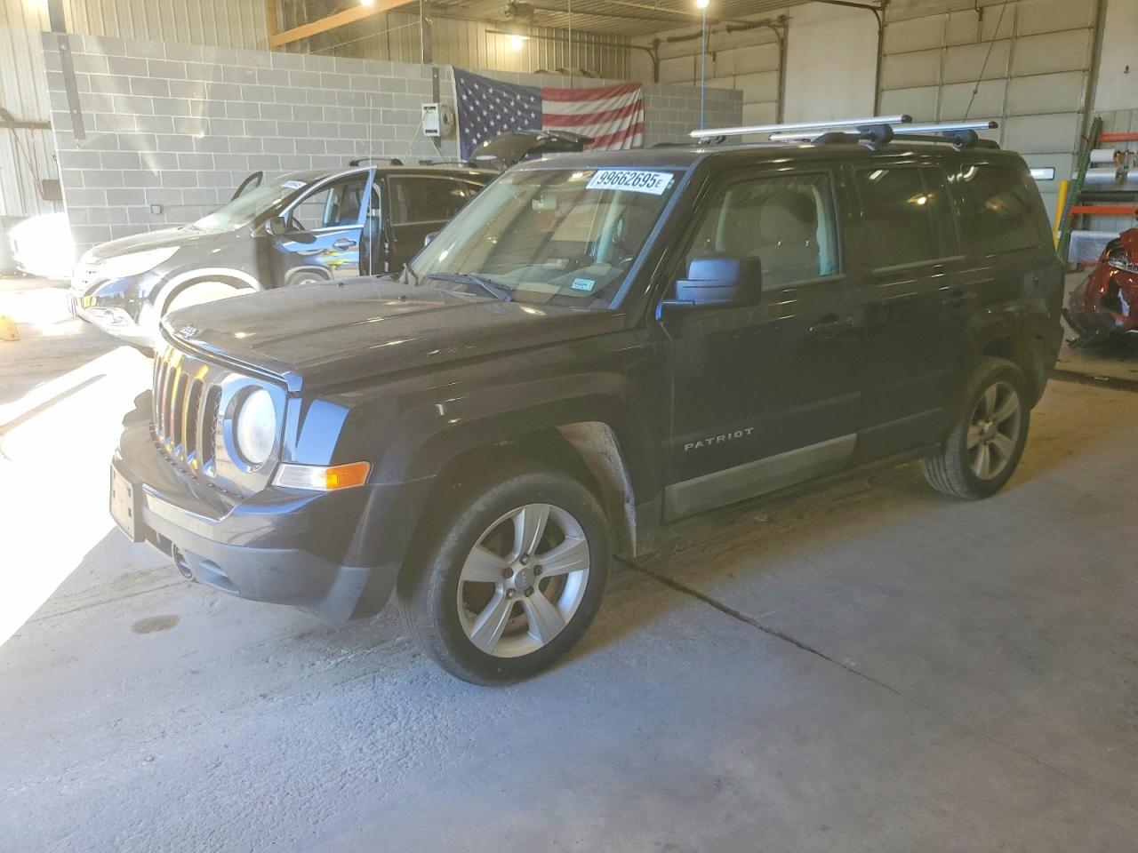 2011 Jeep Patriot North, VIN 1J4NF2GBXBD104864 — Front end