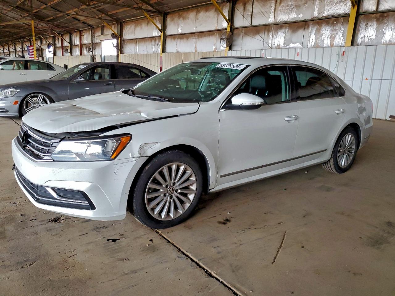 2016 Volkswagen Passat SE, VIN 1VWBT7A39GC027236 — Partial repair