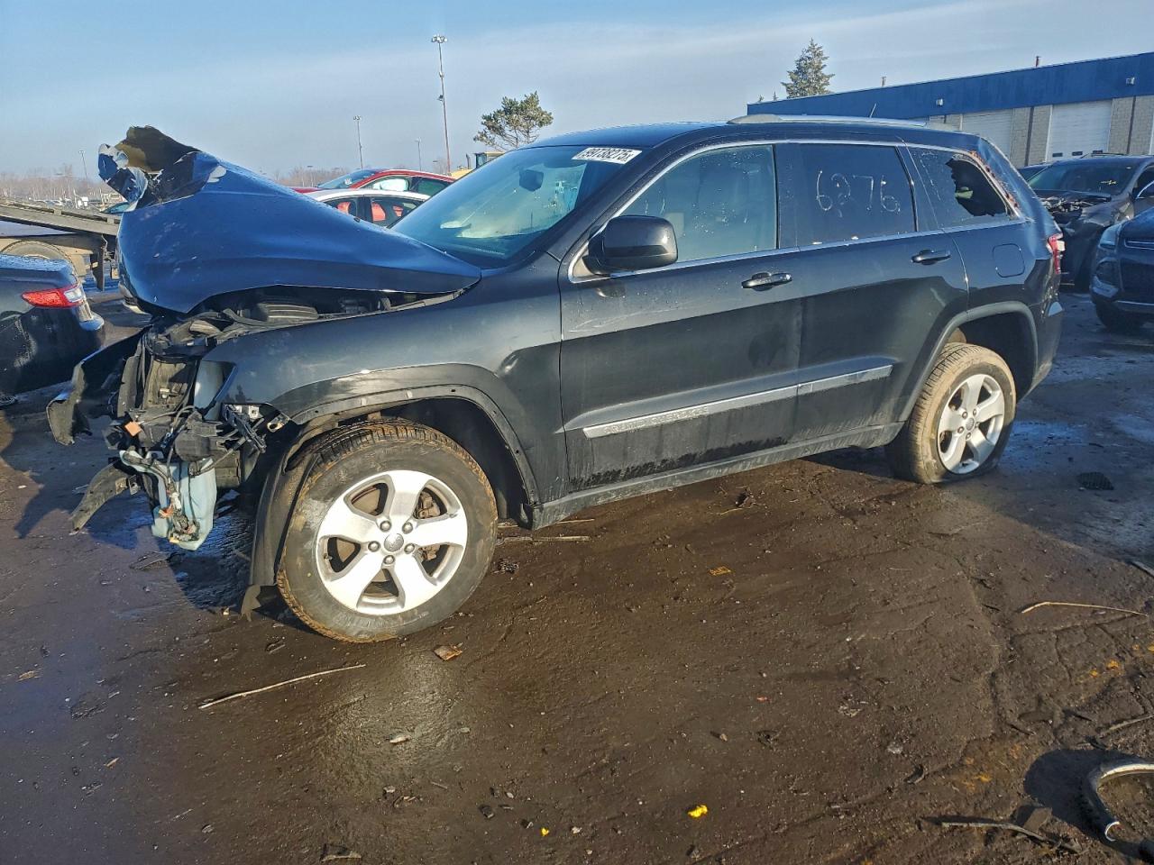 2013 Jeep Grand Cherokee Laredo, VIN 1C4RJFAG8DC616276 — Front end