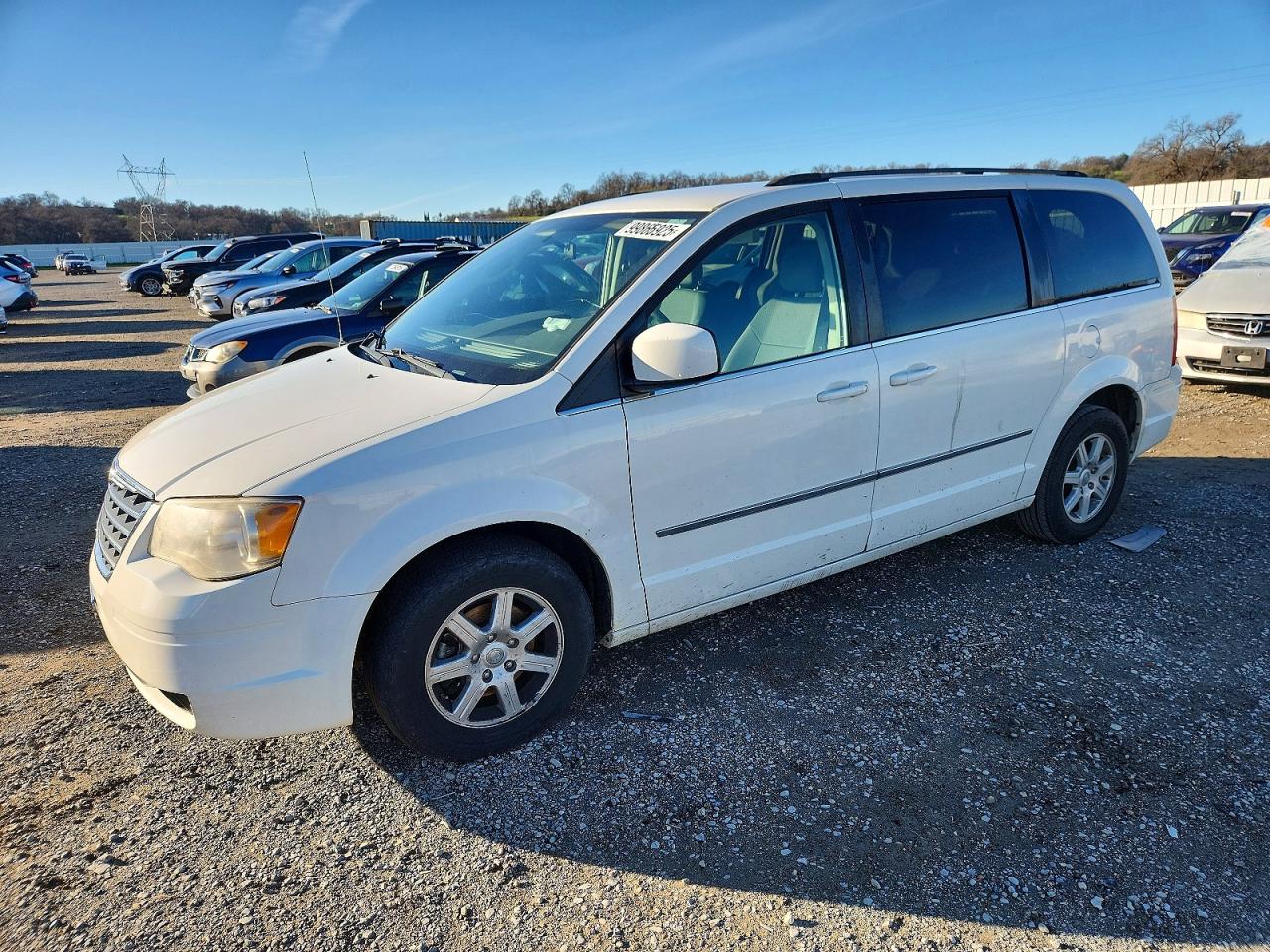 2010 Chrysler Town & Country Touring, VIN 2A4RR5DX4AR343624 — Water / flood