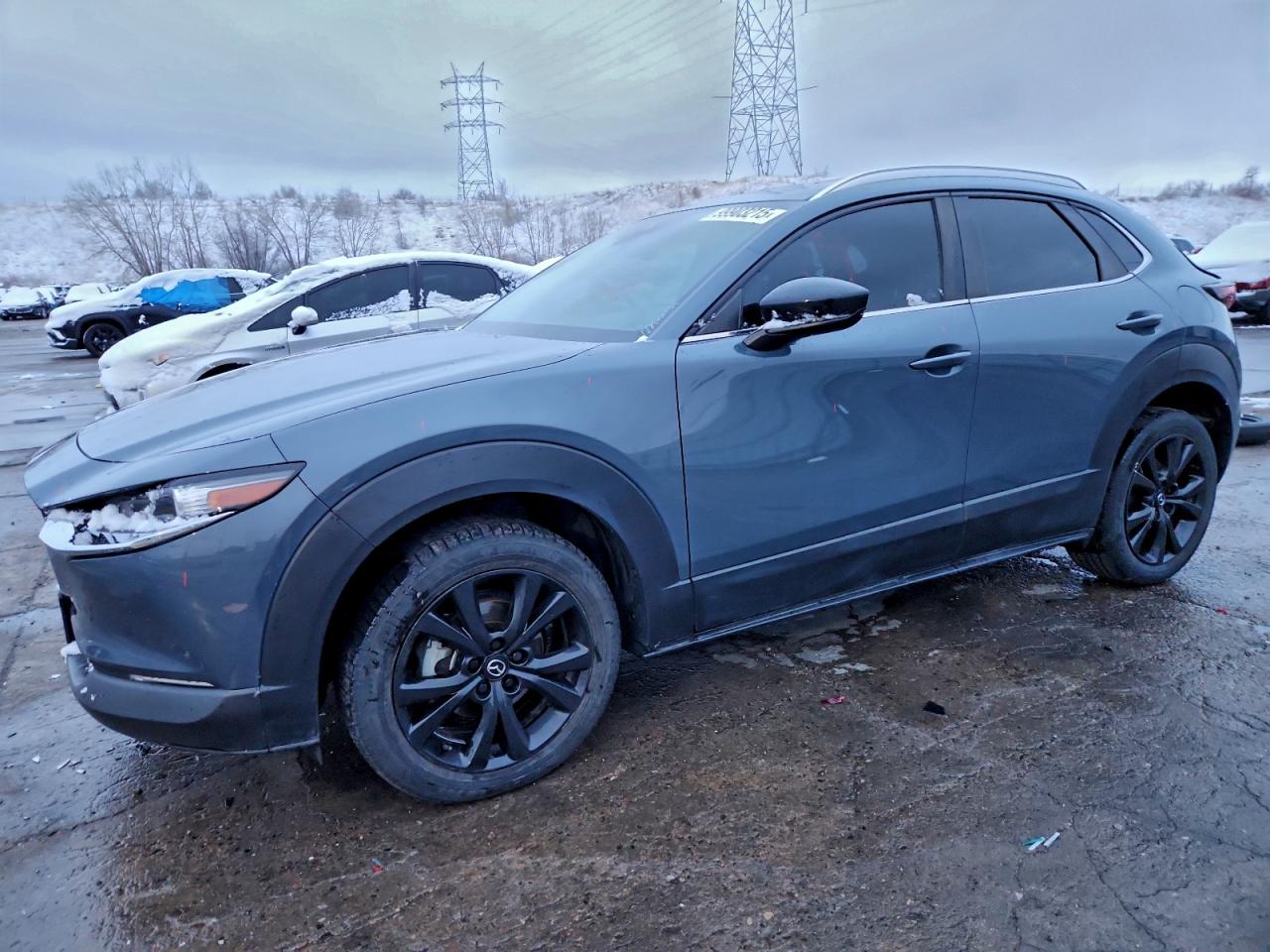 2023 Mazda CX-30 S Carbon Edition, VIN 3MVDMBCM8PM570981 — Rear end