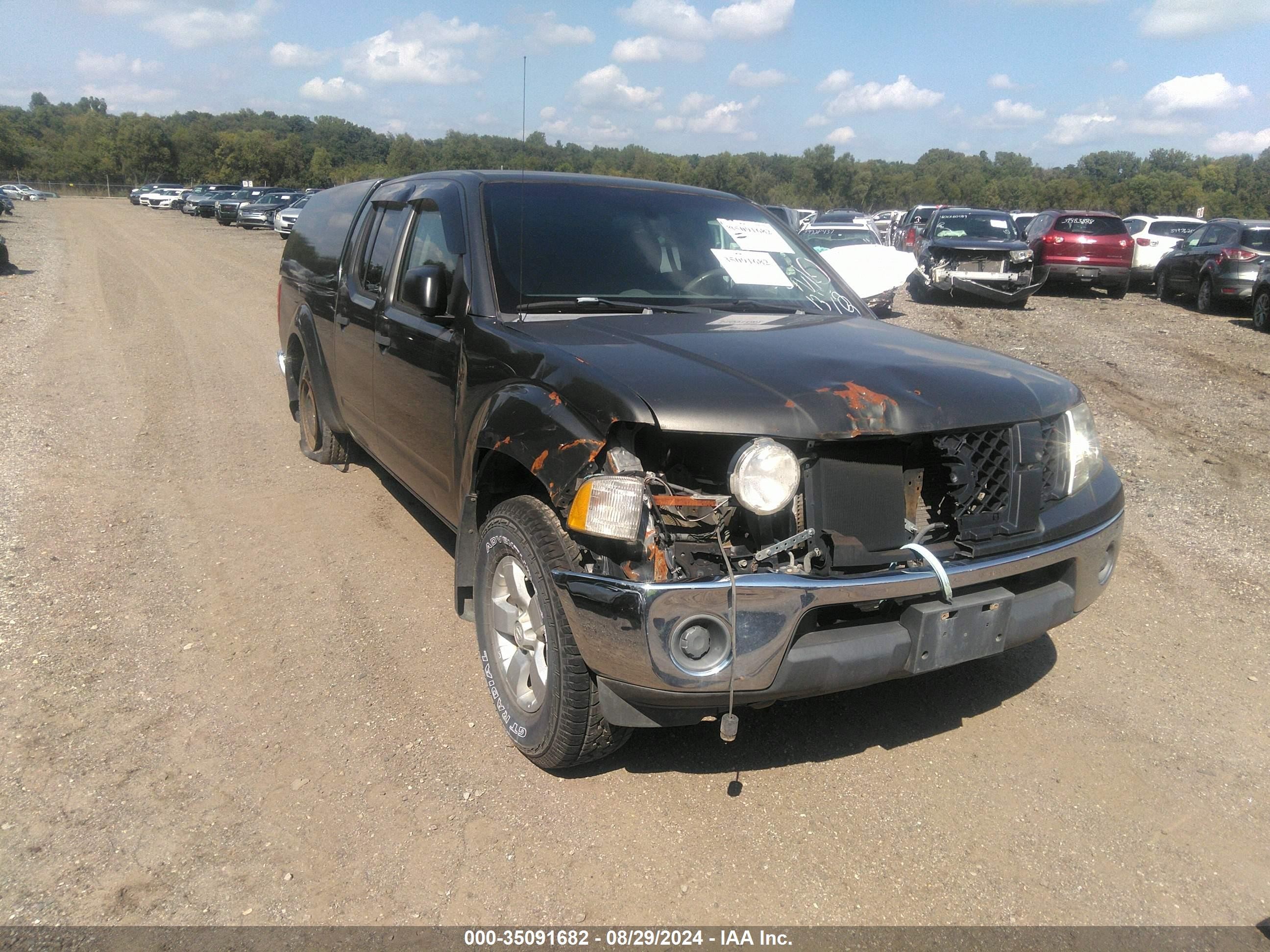 2009 Nissan Frontier SE, VIN 1N6AD09W89C405712 — Side