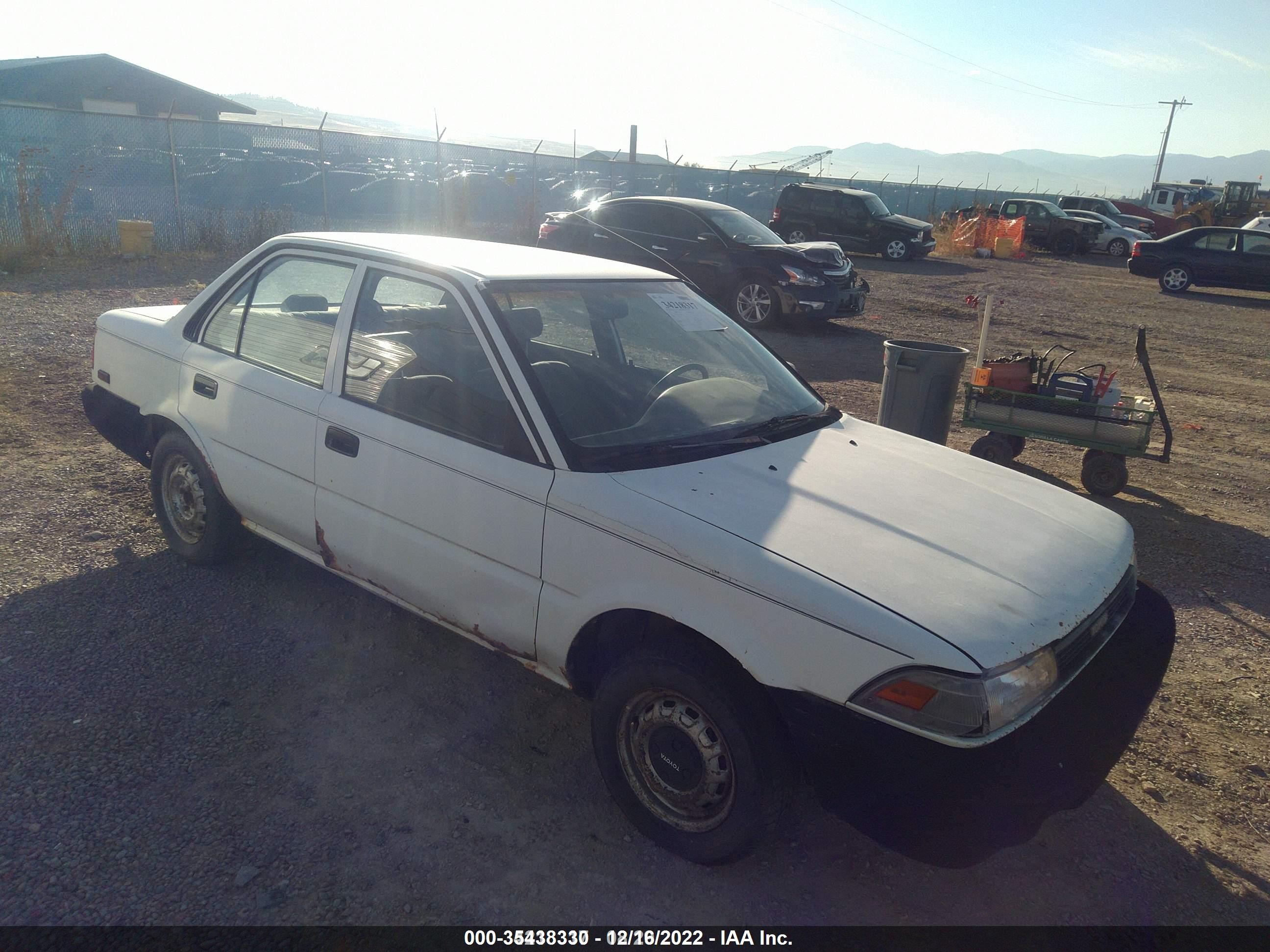 1990 Toyota Corolla, VIN JT2AE91A3L3403791 — Side