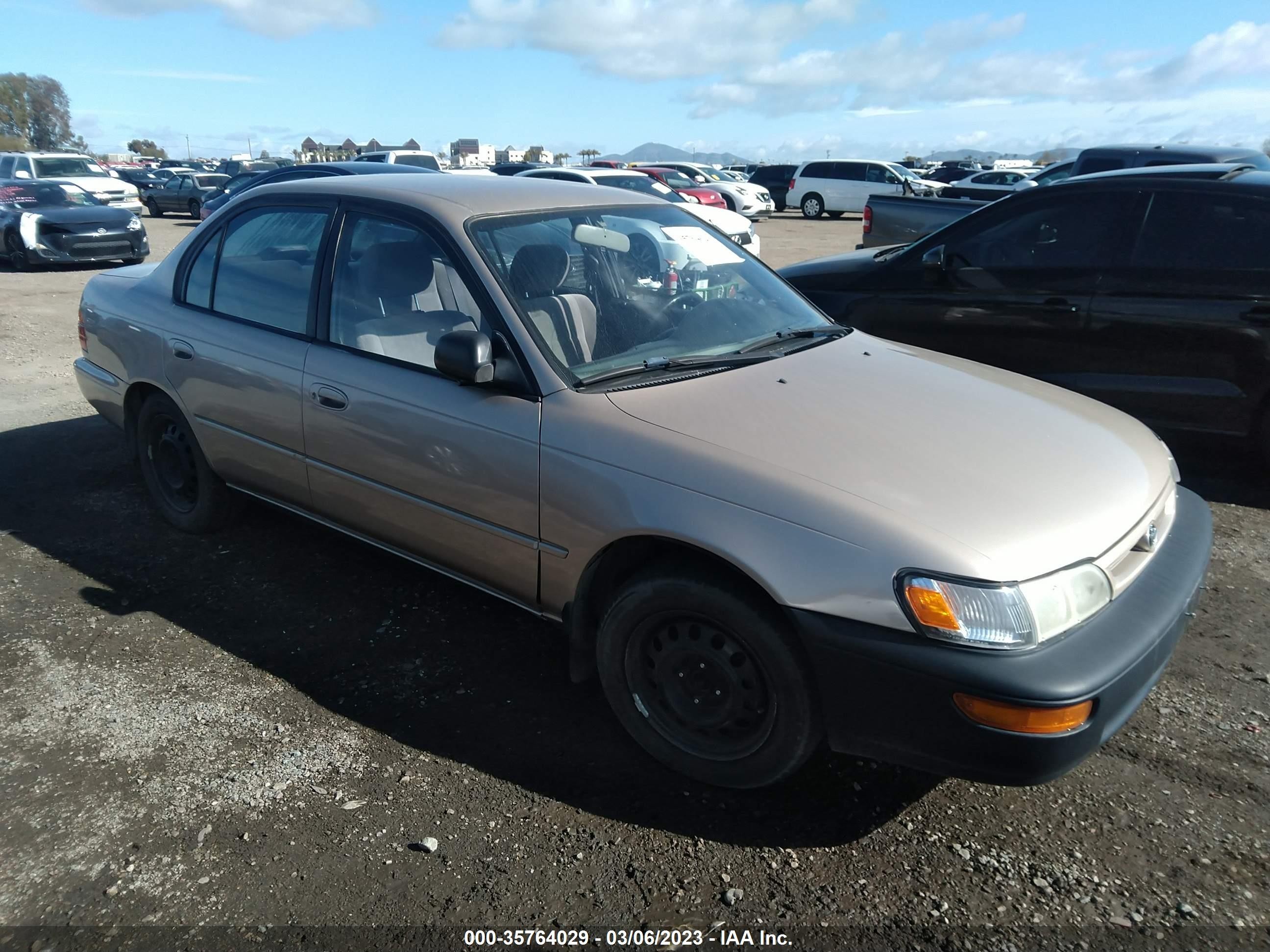 1995 Toyota Corolla DX, VIN 2T1AE09B5SC121609 — Side