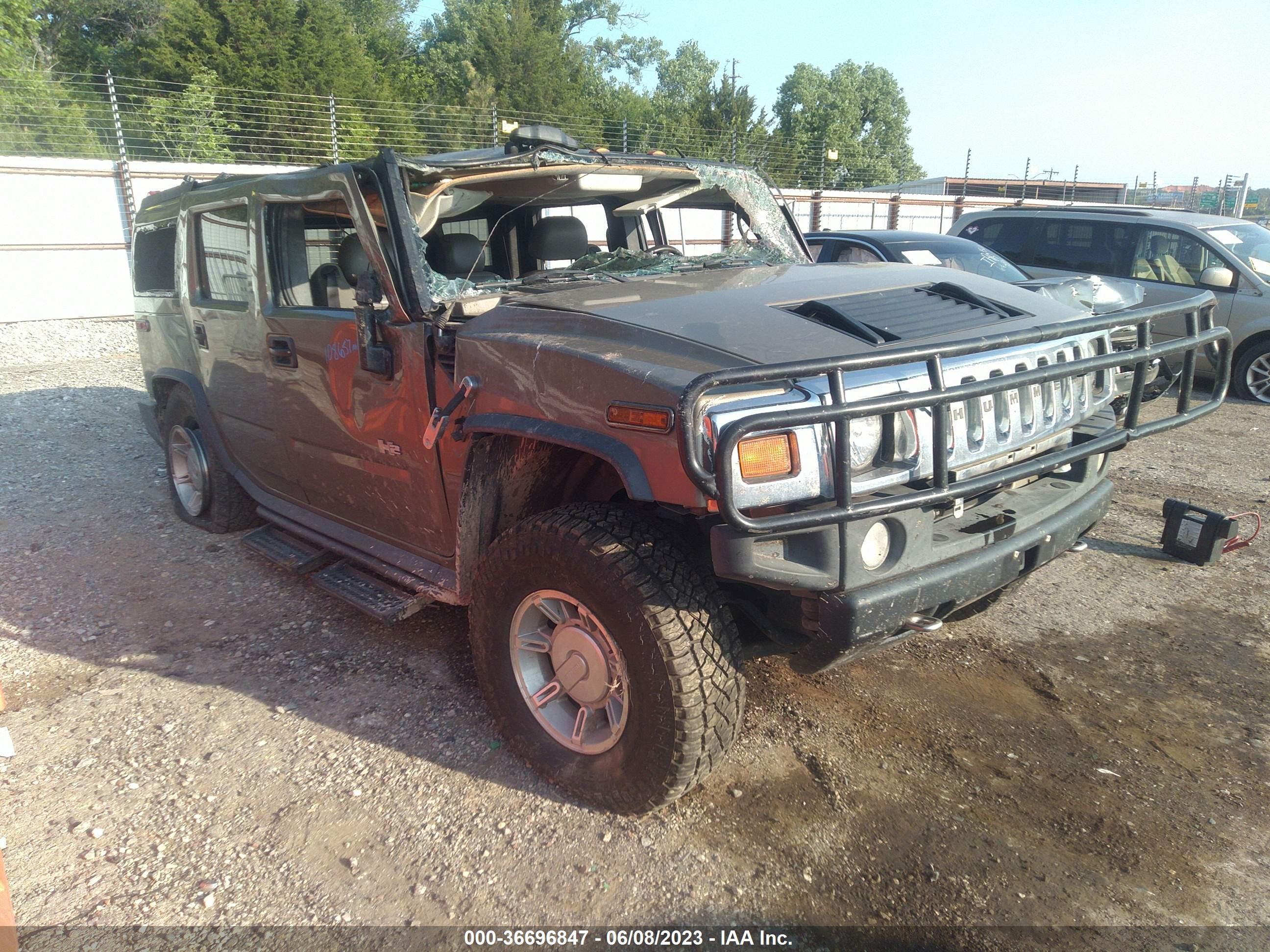 2005 Hummer H2 SUV, VIN 5GRGN23U25H118925 — Rollover