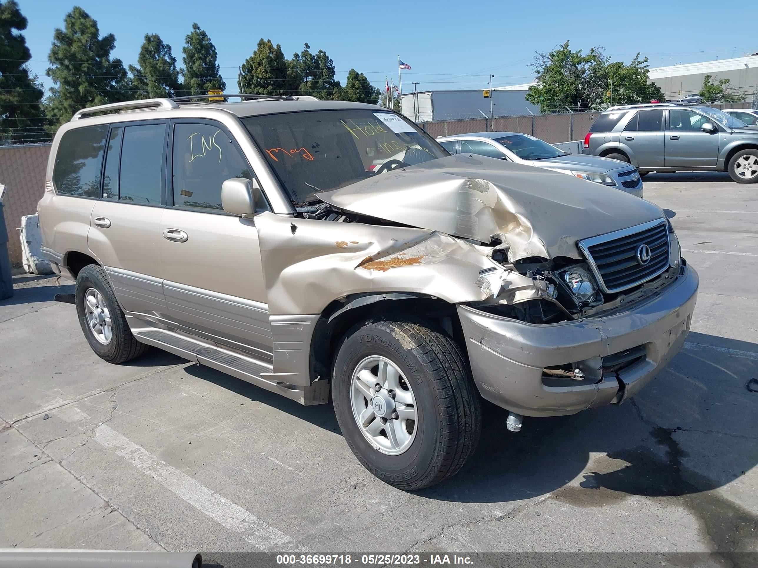 1999 Lexus LX 470, VIN JT6HT00WXX0029036 — Front end