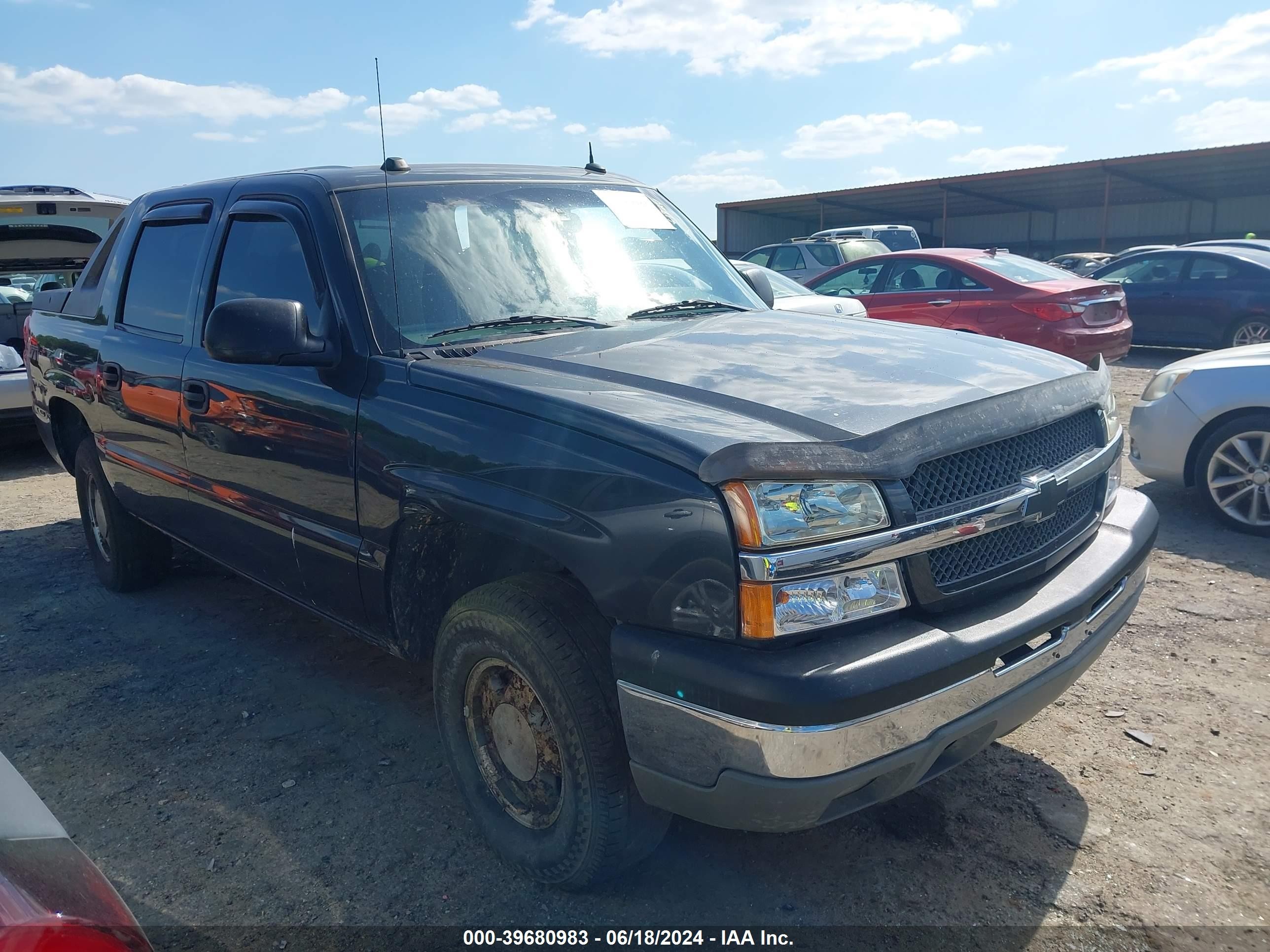 2004 Chevrolet Avalanche Z71, VIN 3GNEK12T74G166814 — Side