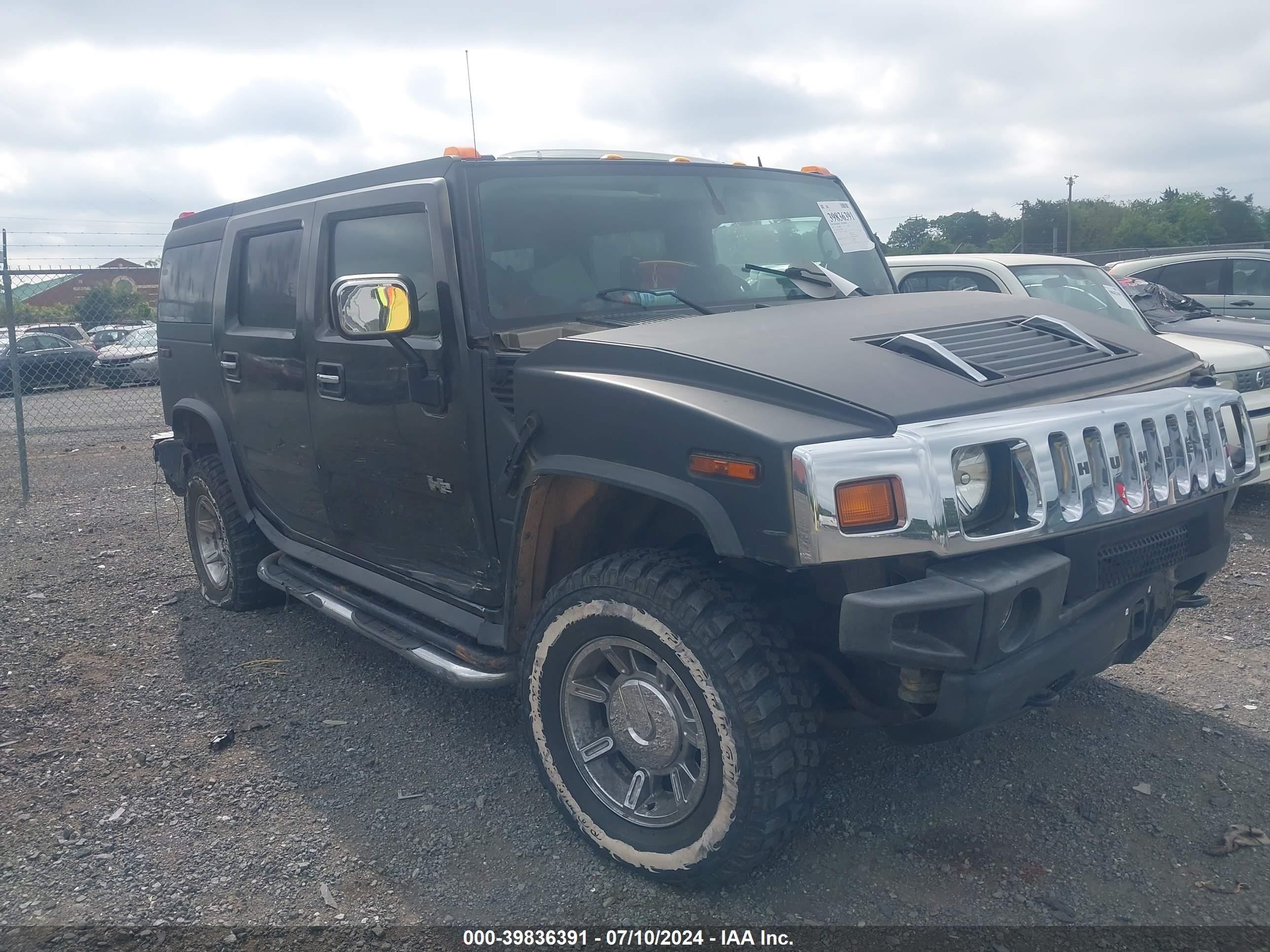 2005 Hummer H2 SUV, VIN 5GRGN23U75H126843 — Theft recovery